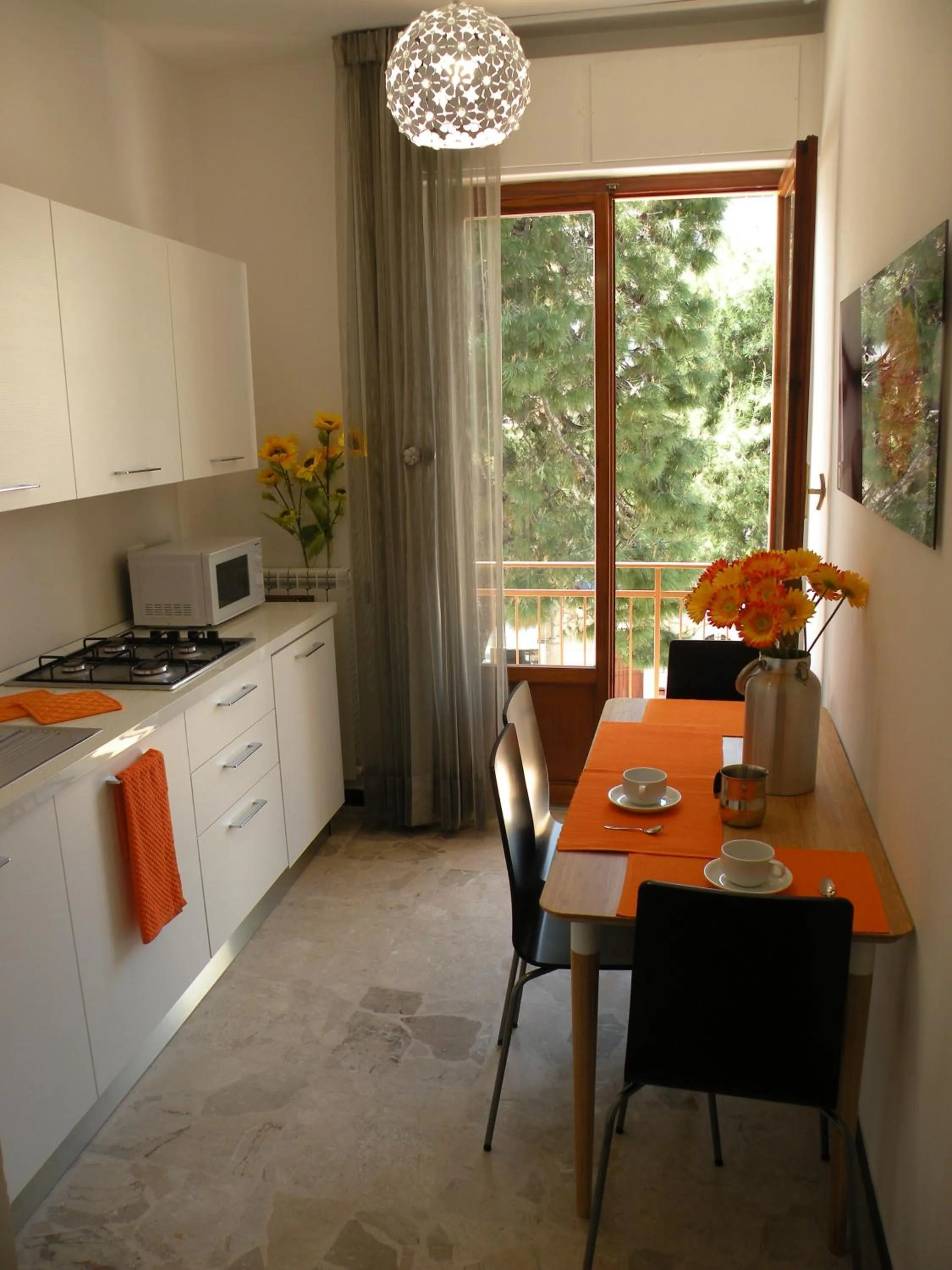 Kitchen or kitchenette in La Casa sul Corso B&B
