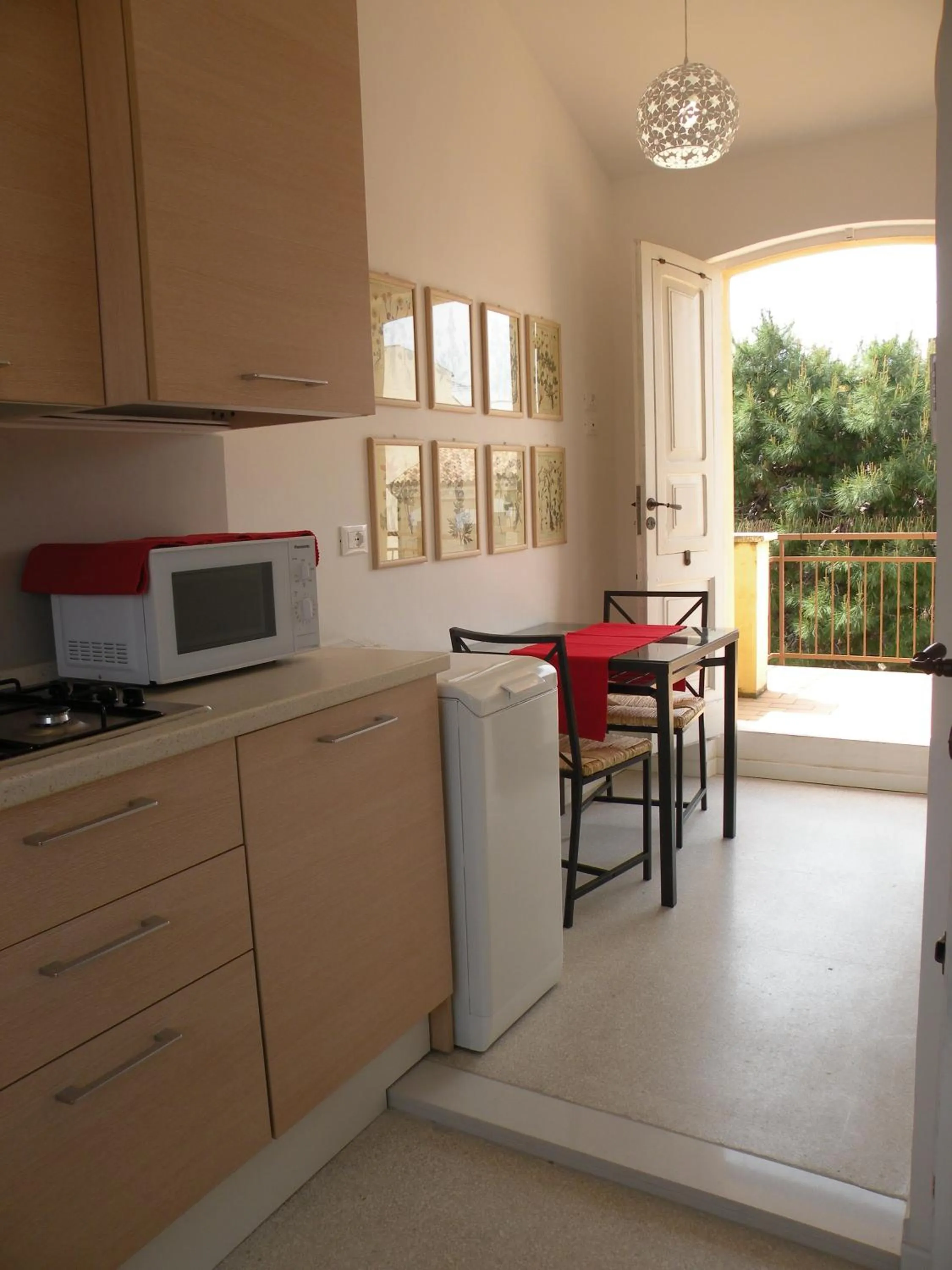 Kitchen or kitchenette in La Casa sul Corso B&B