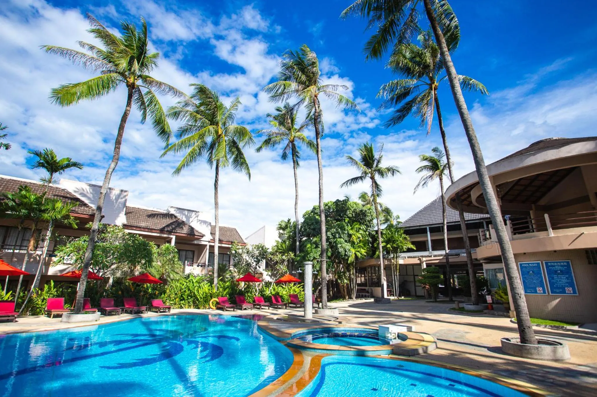 Swimming pool in Coconut Village Resort Phuket - SHA Extra Plus