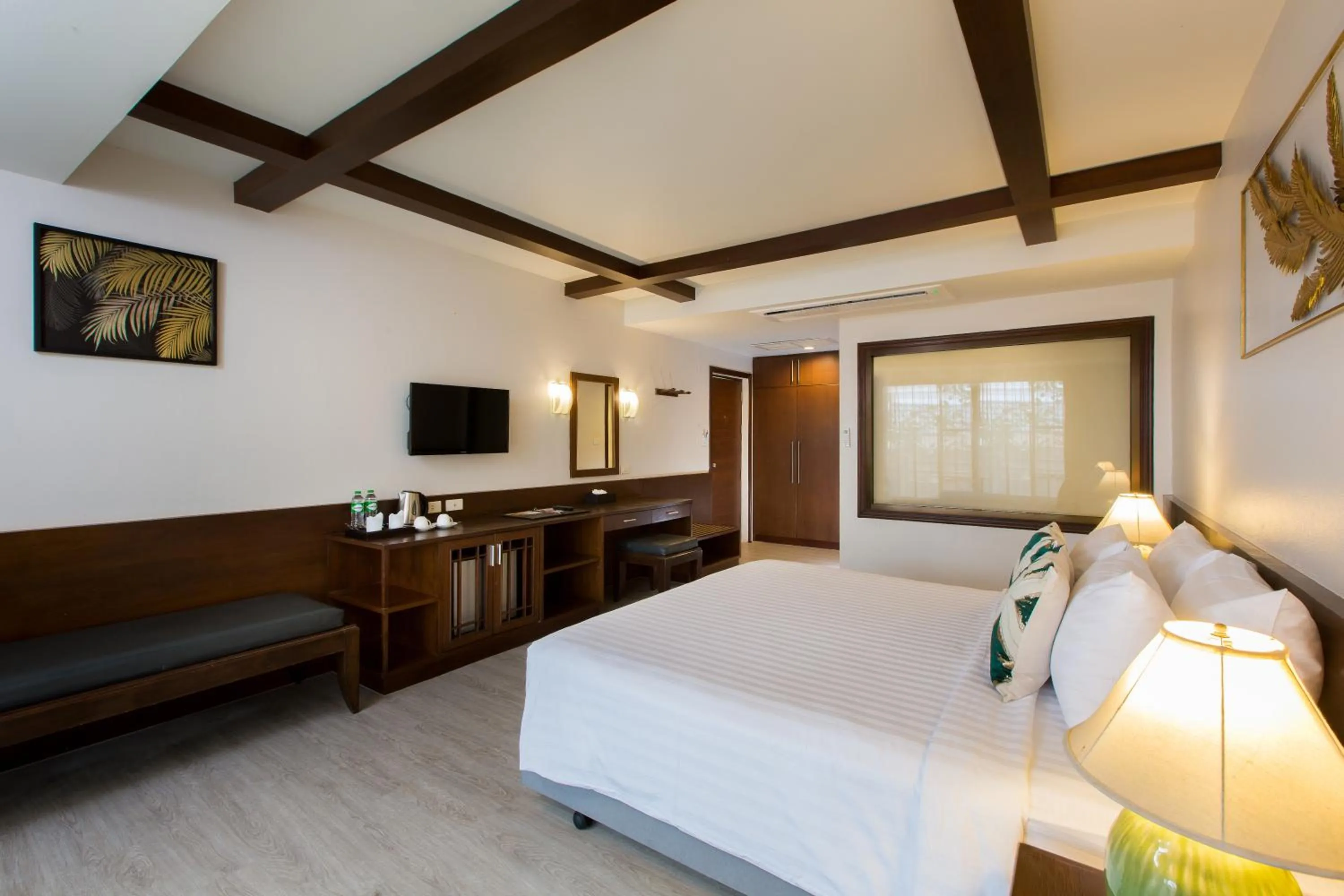 Bed in Coconut Village Resort Phuket - SHA Extra Plus