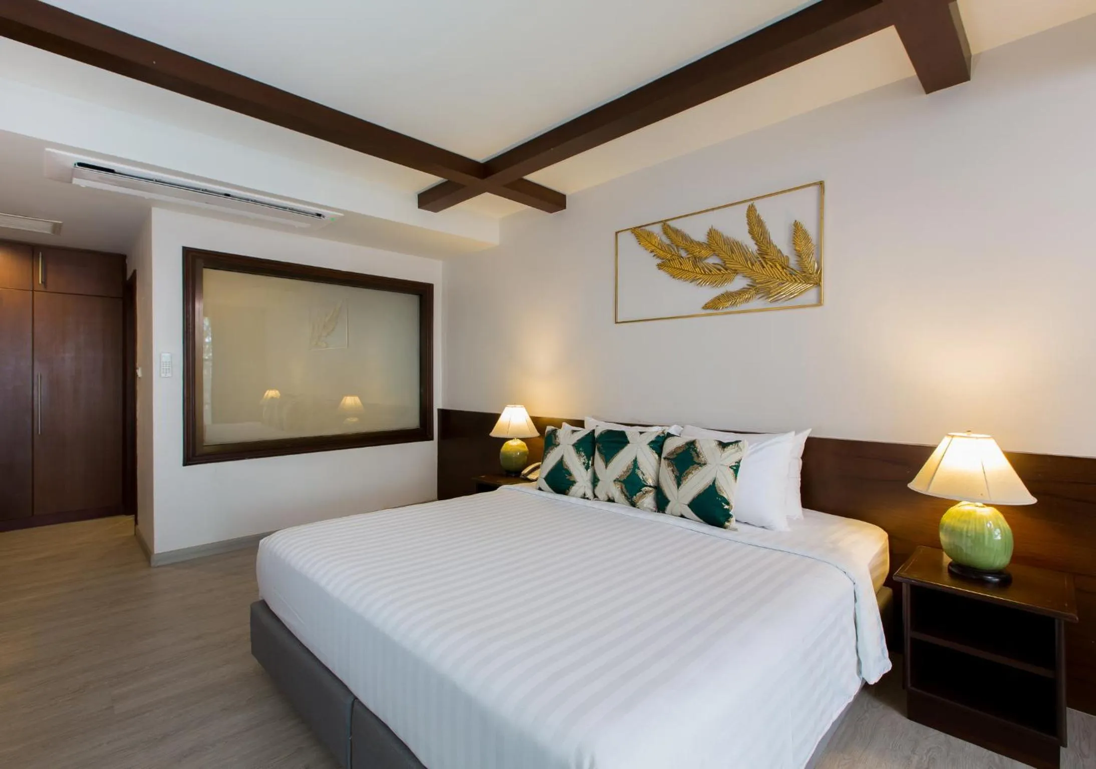 Bed in Coconut Village Resort Phuket - SHA Extra Plus