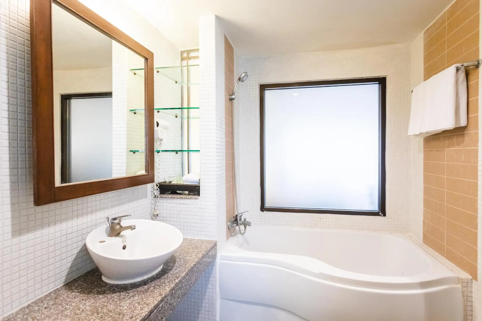 Bathroom in Coconut Village Resort Phuket - SHA Extra Plus