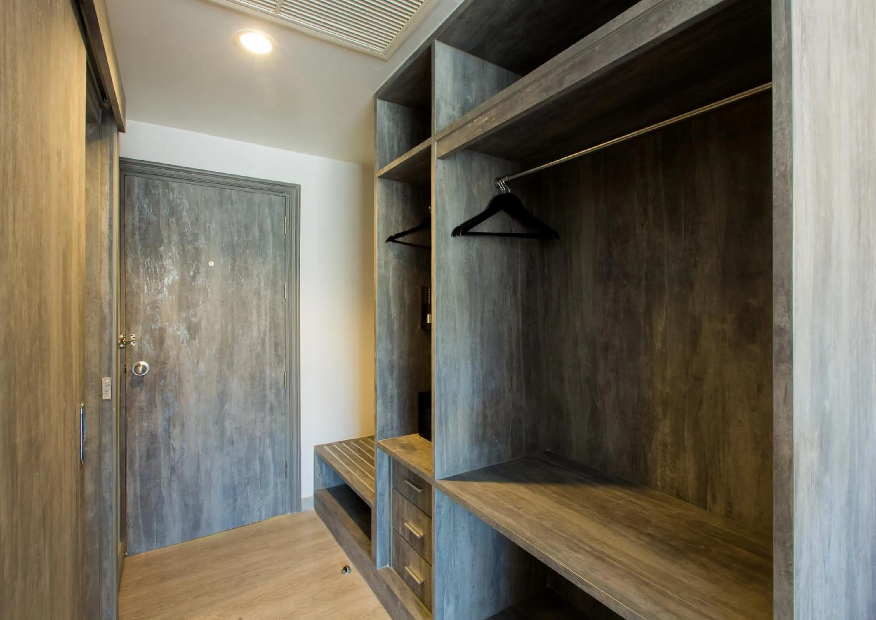 Bedroom in Coconut Village Resort Phuket - SHA Extra Plus