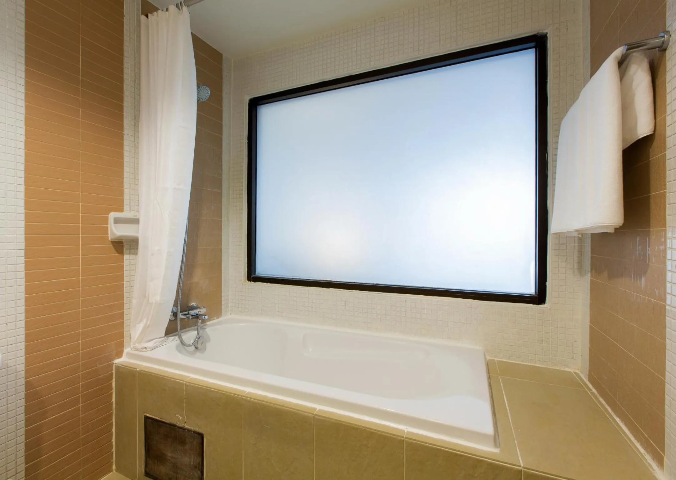 Bathroom in Coconut Village Resort Phuket - SHA Extra Plus