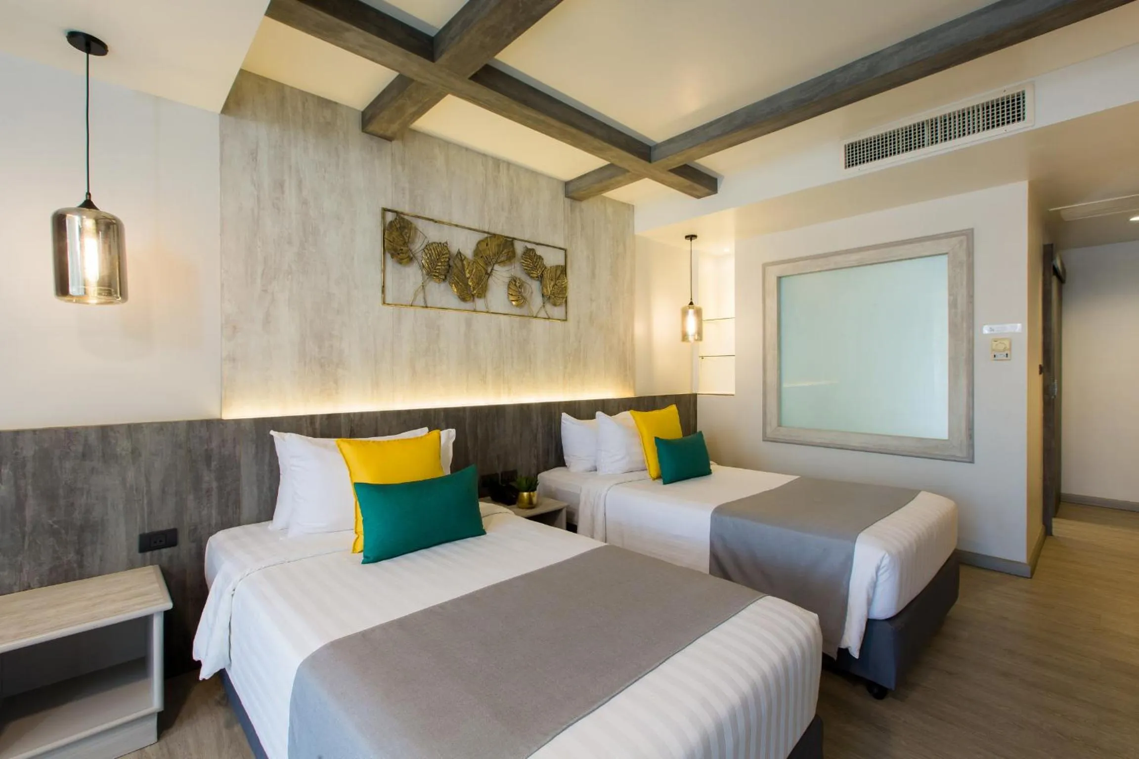 Bed in Coconut Village Resort Phuket - SHA Extra Plus