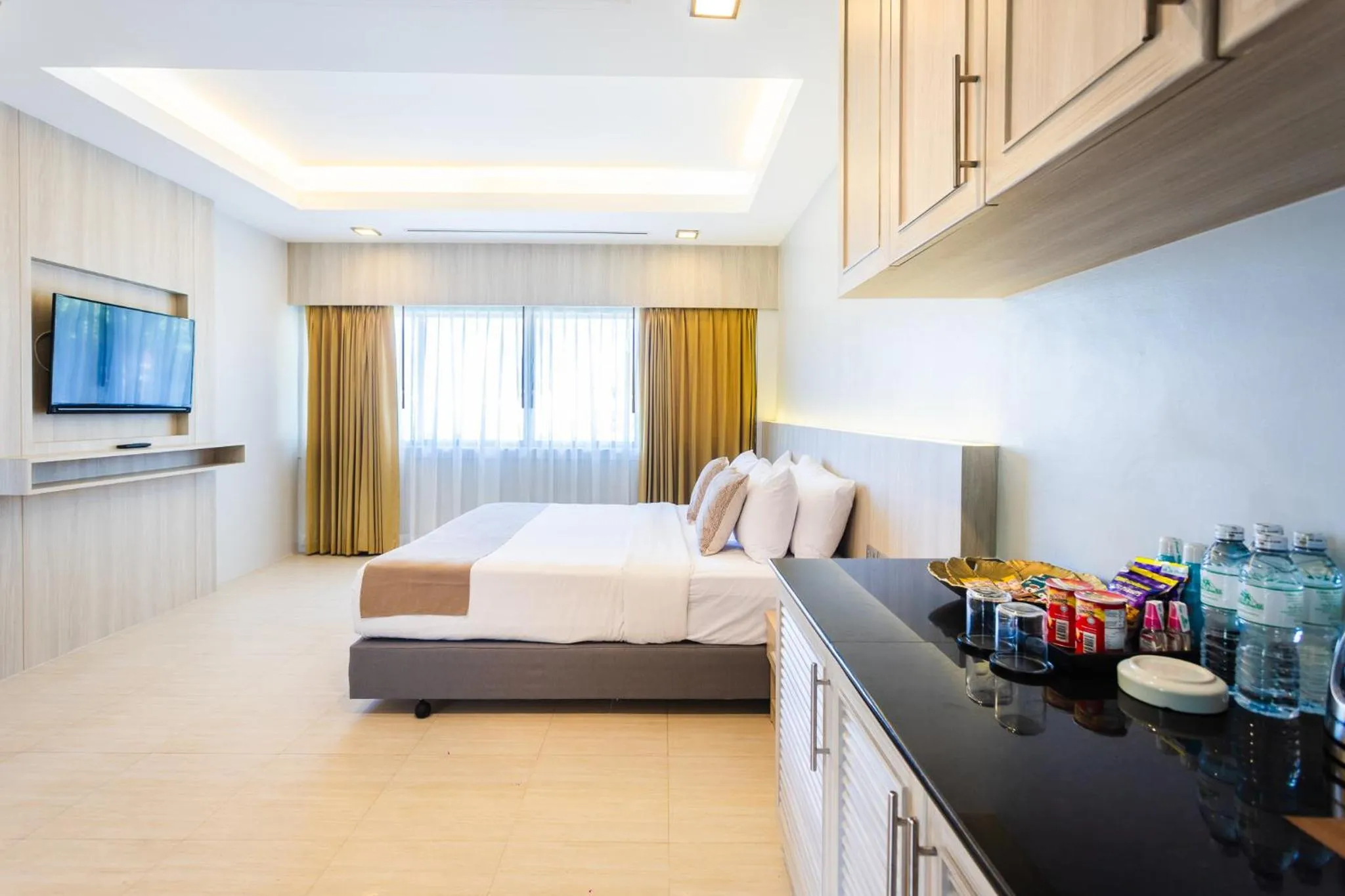 Bed in Coconut Village Resort Phuket - SHA Extra Plus