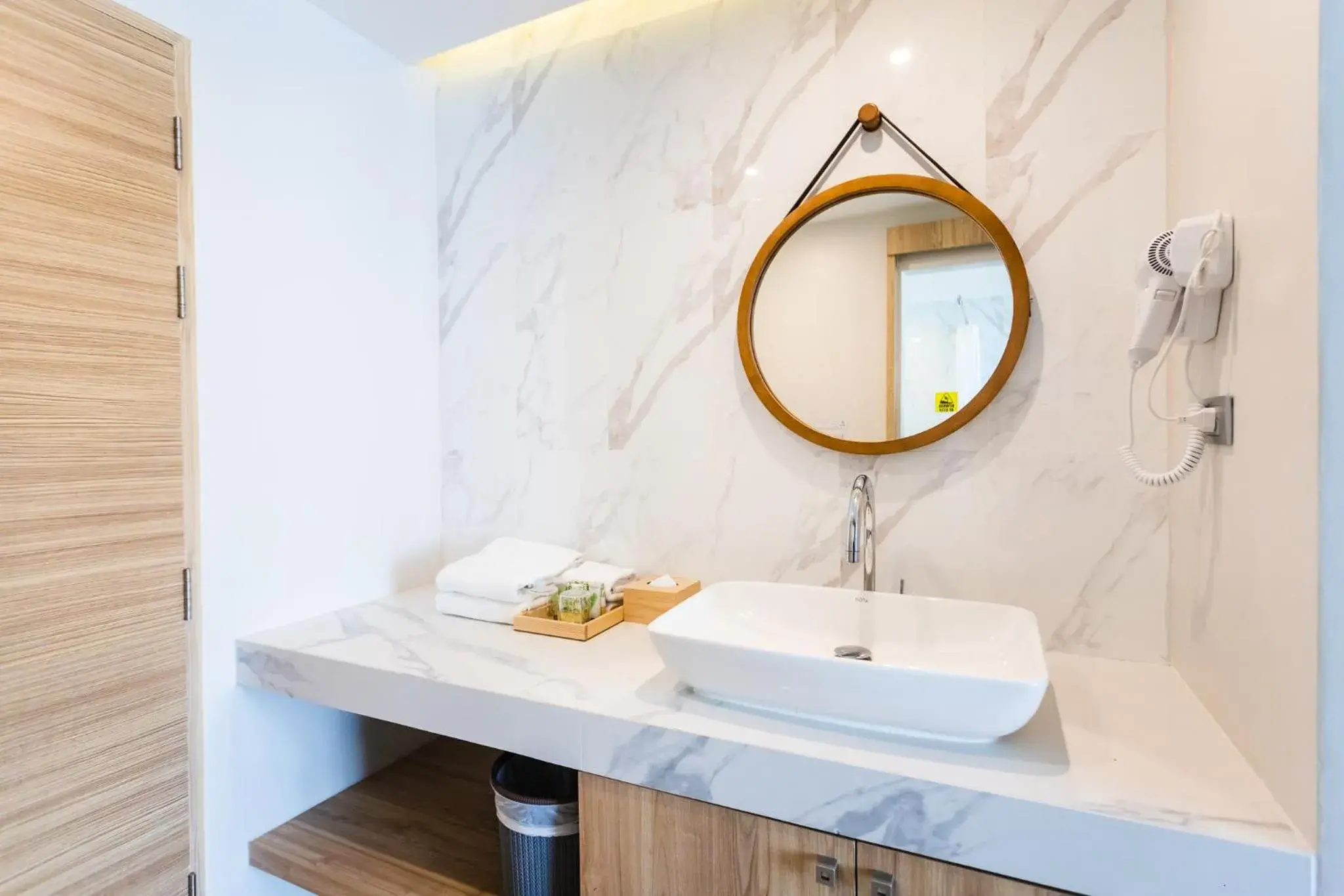 Bathroom in Coconut Village Resort Phuket - SHA Extra Plus Bathroom in Coconut Village Resort Phuket - SHA Extra Plus