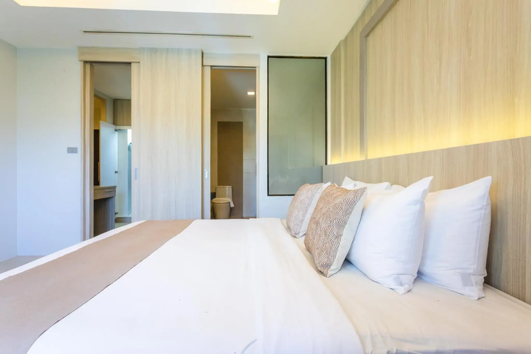 Bedroom, Bed in Coconut Village Resort Phuket - SHA Extra Plus Bedroom, Bed in Coconut Village Resort Phuket - SHA Extra Plus