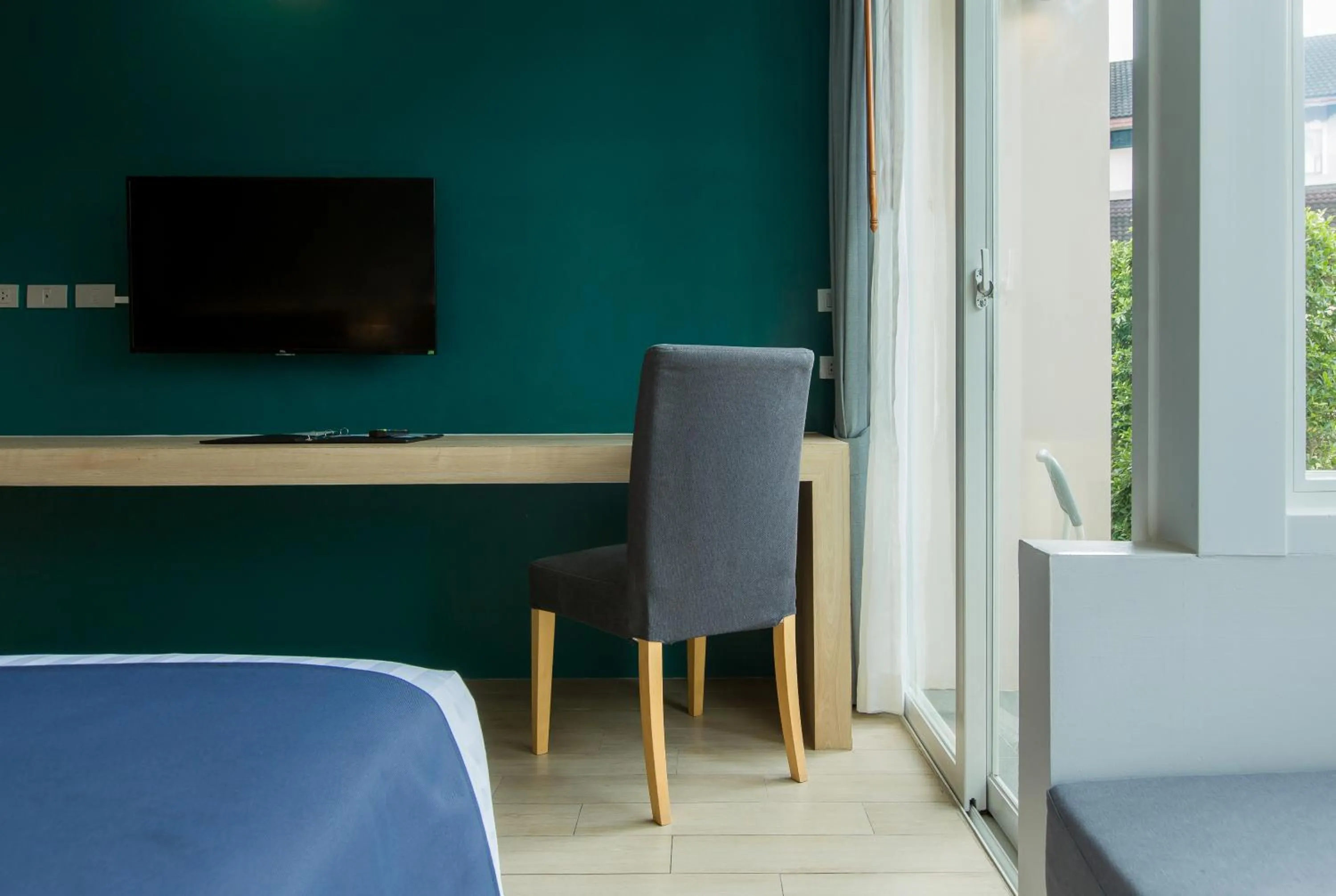 TV and multimedia in Coconut Village Resort Phuket - SHA Extra Plus