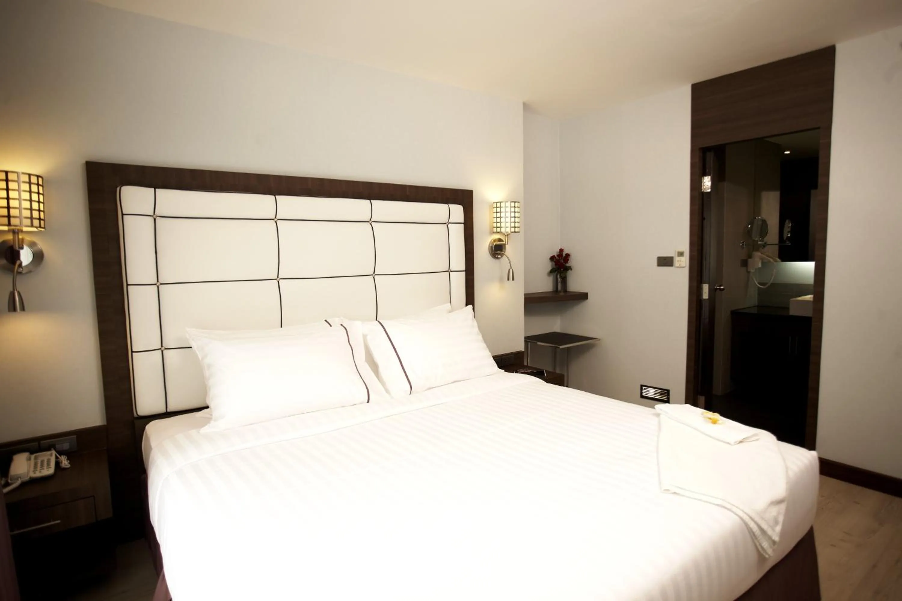 Bed in Sukhumvit Suites Hotel