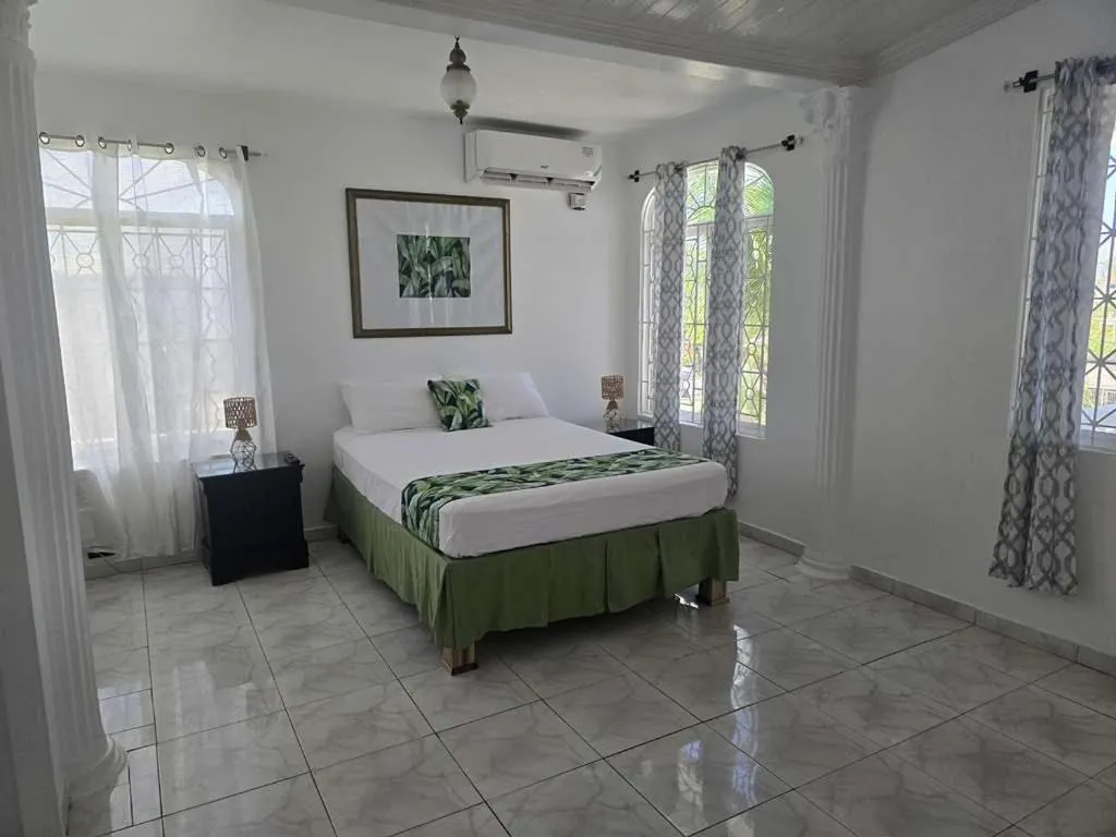 Bed in Paradise Palms Jamaica Vacation Rental
