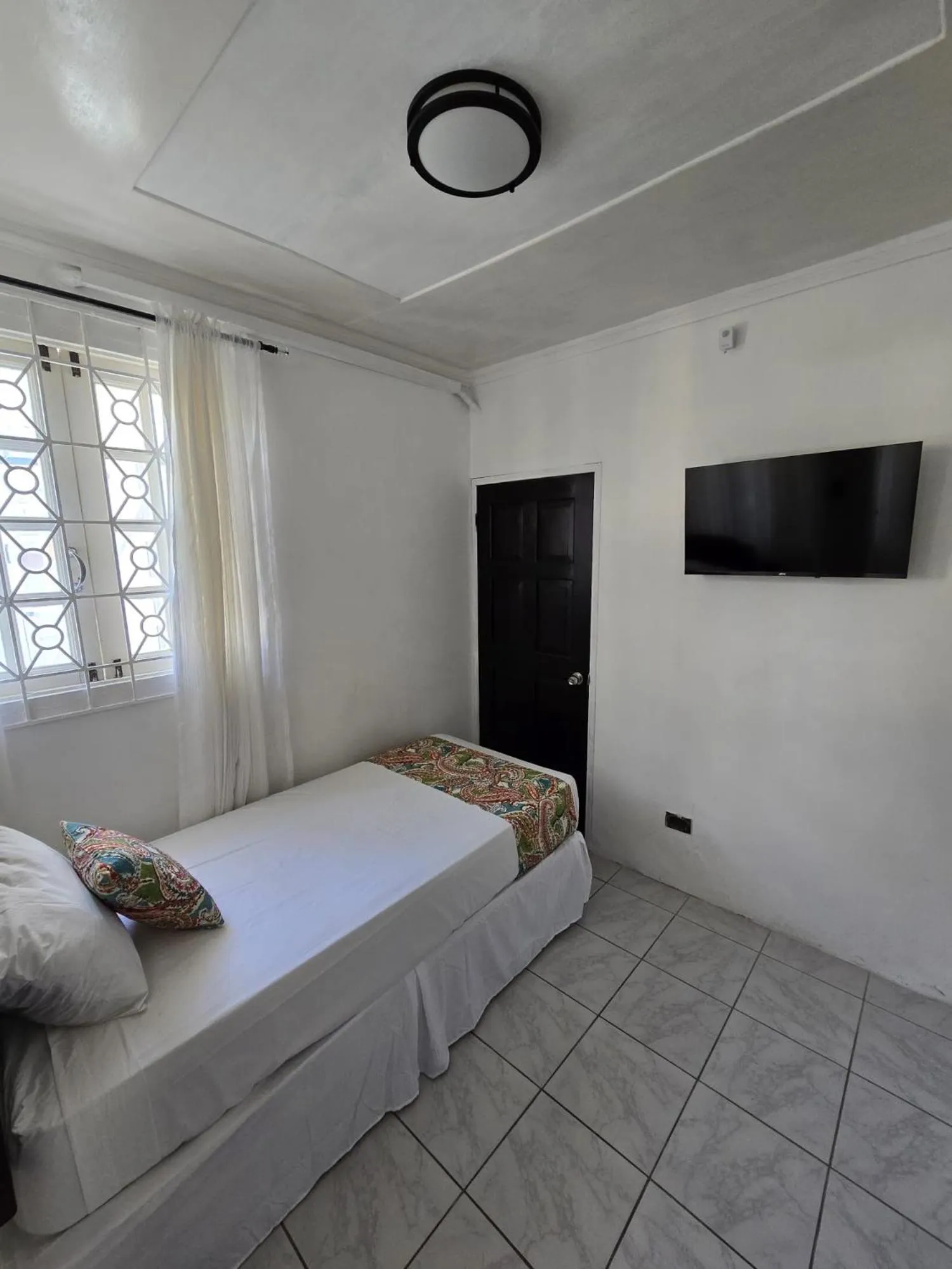 Bed in Paradise Palms Jamaica Vacation Rental