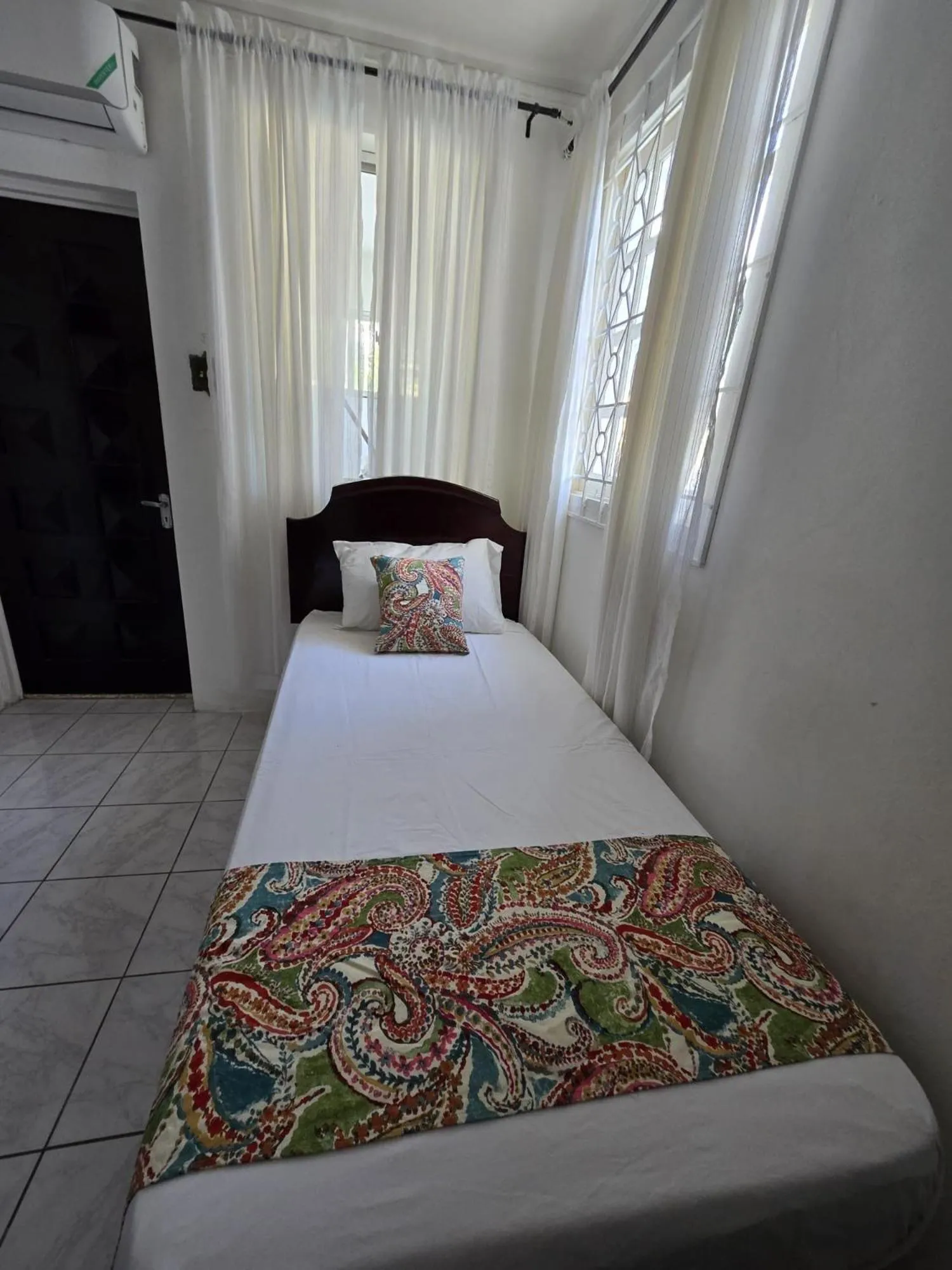 Bed in Paradise Palms Jamaica Vacation Rental