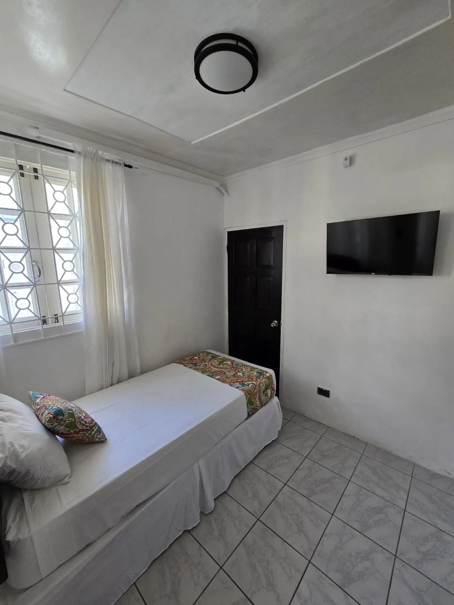 Bed in Paradise Palms Jamaica Vacation Rental