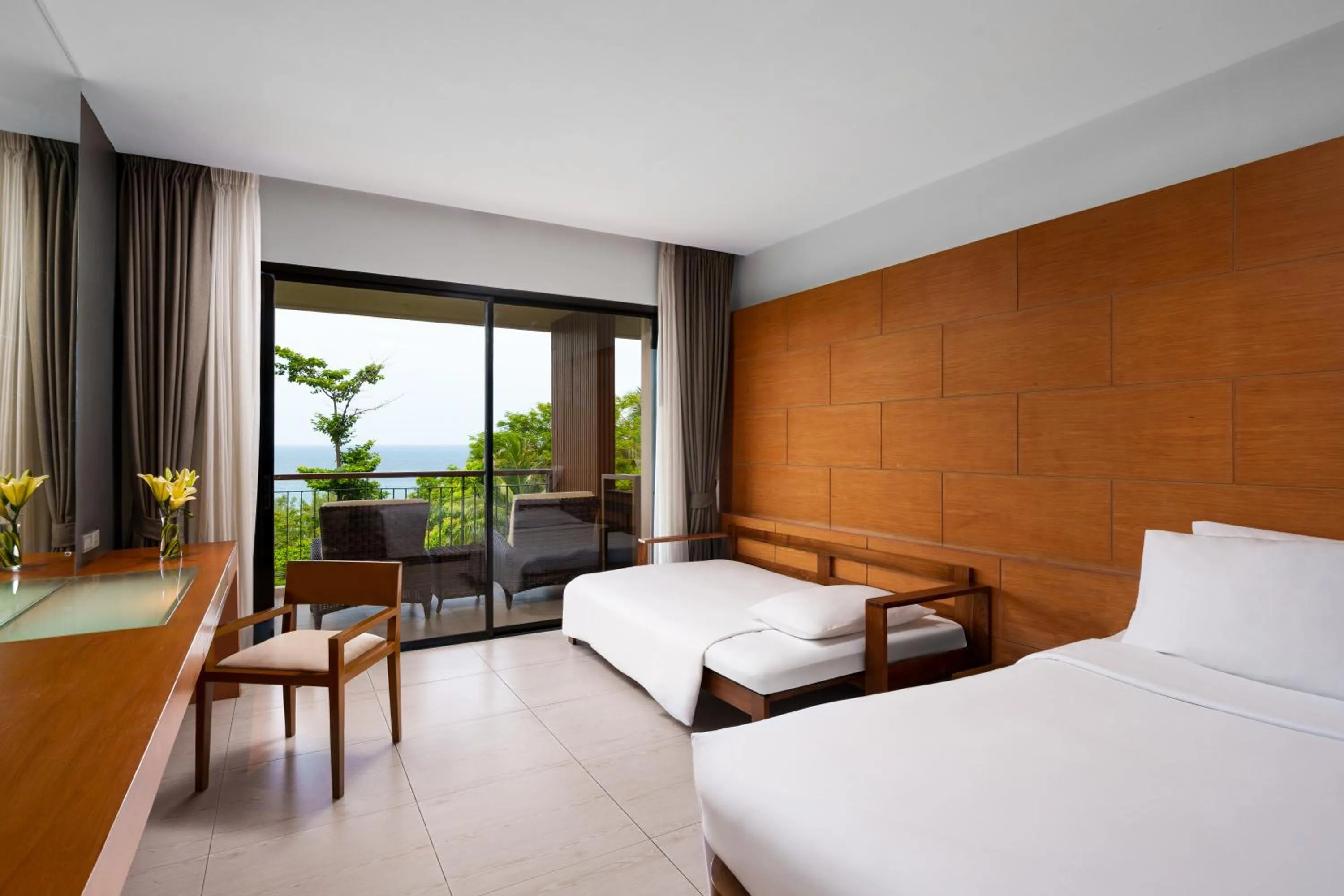 Bed in Novotel Phuket Kata Avista Resort and Spa