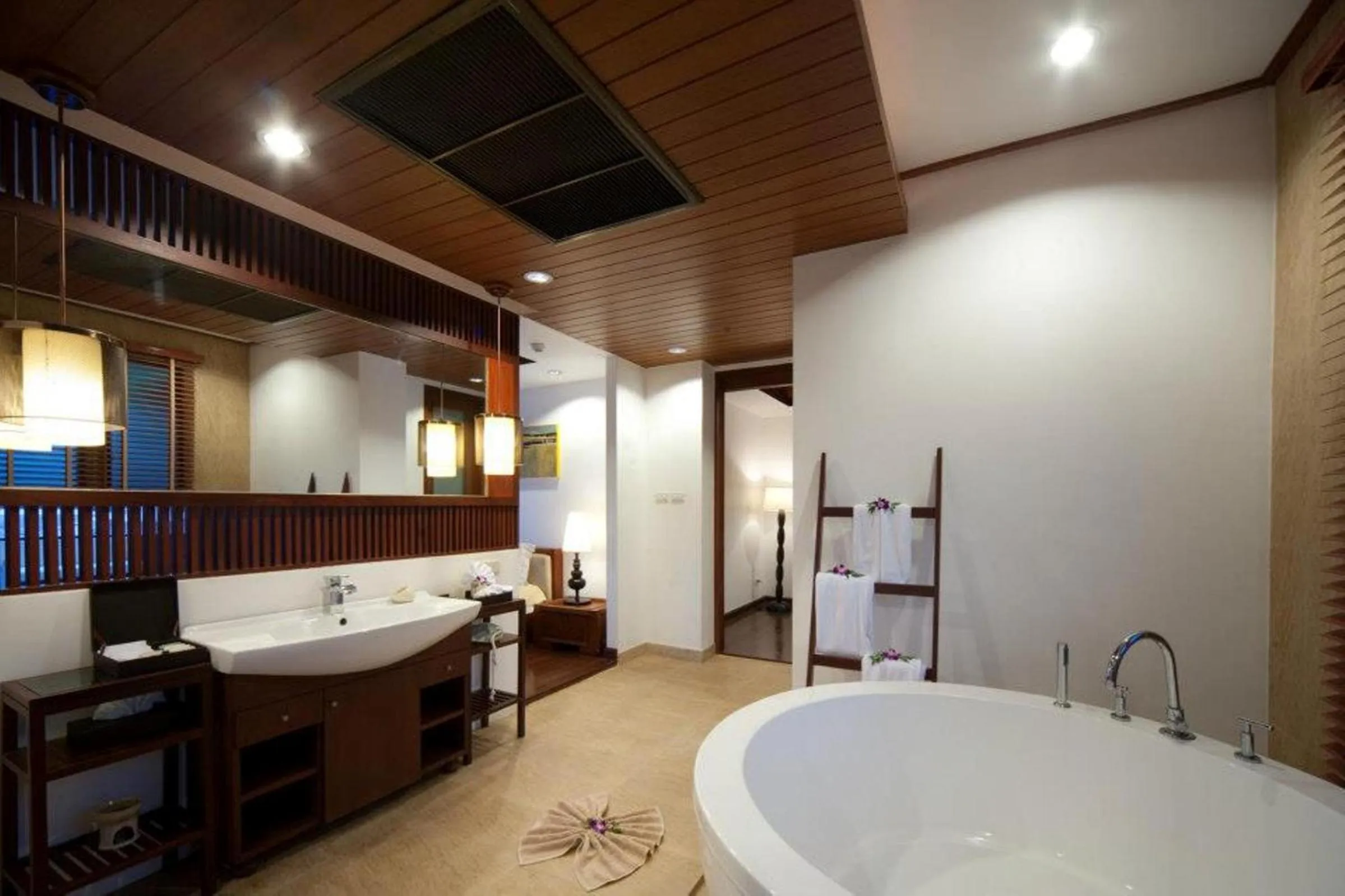 Bathroom, Bed in The Sarann Koh Samui, Suites & Villas