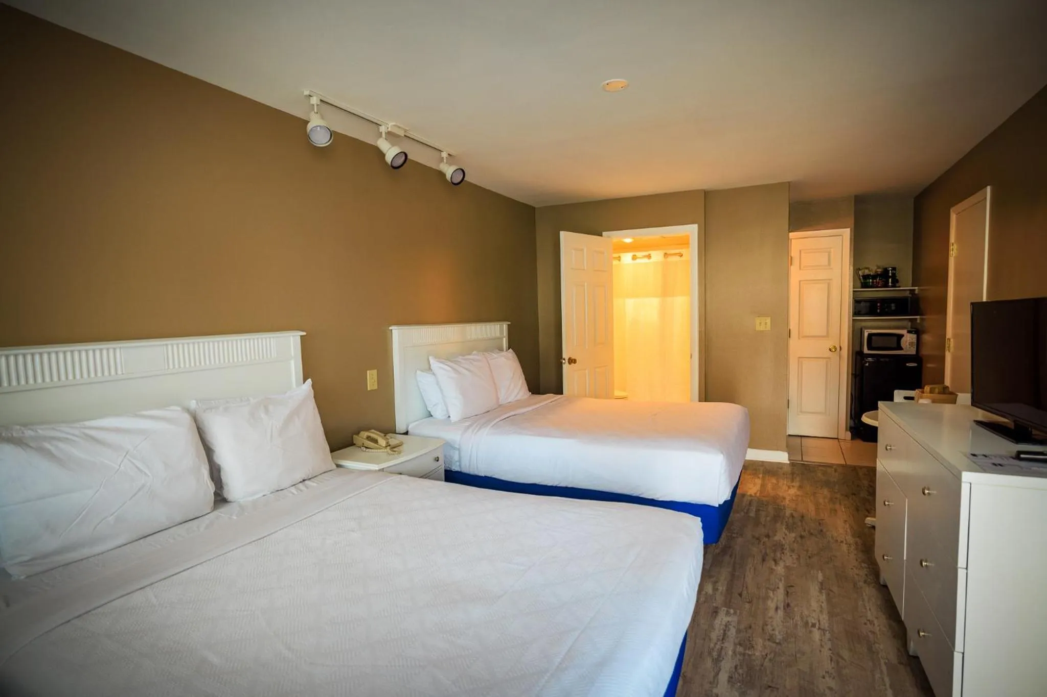 Bed in The White Sands Resort and Spa