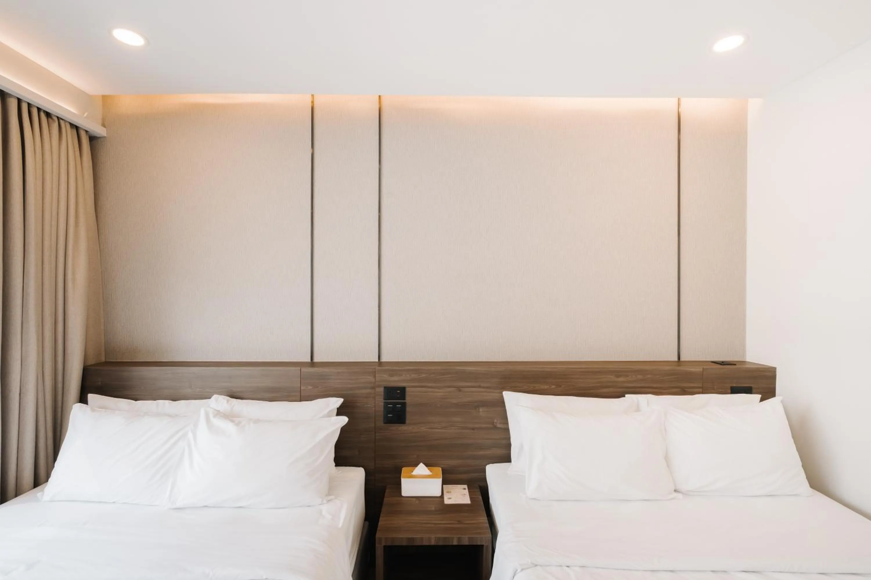 Bed in Pinnacle Lumpini Park Hotel