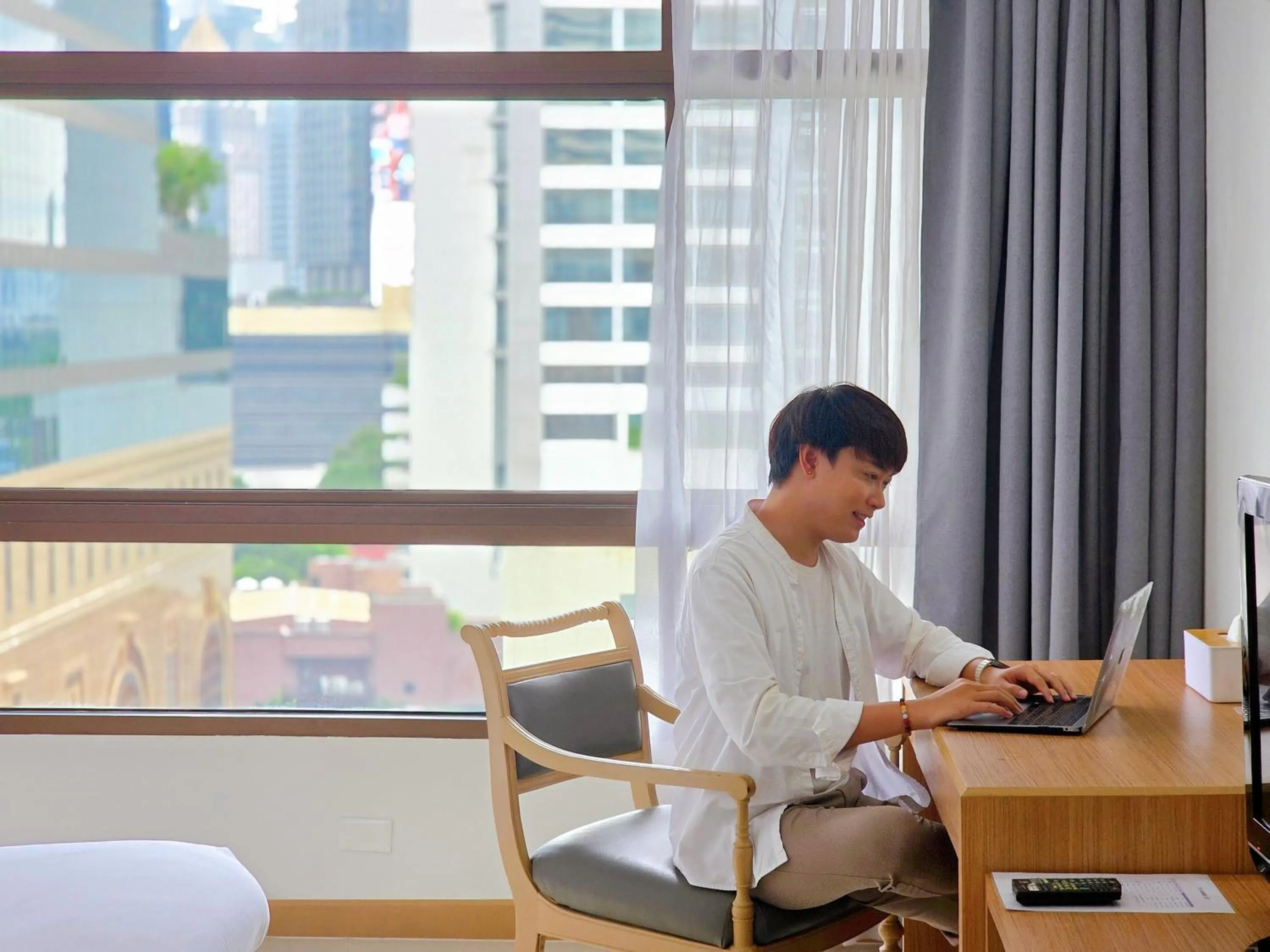 Bedroom in Pinnacle Lumpinee Park Hotel