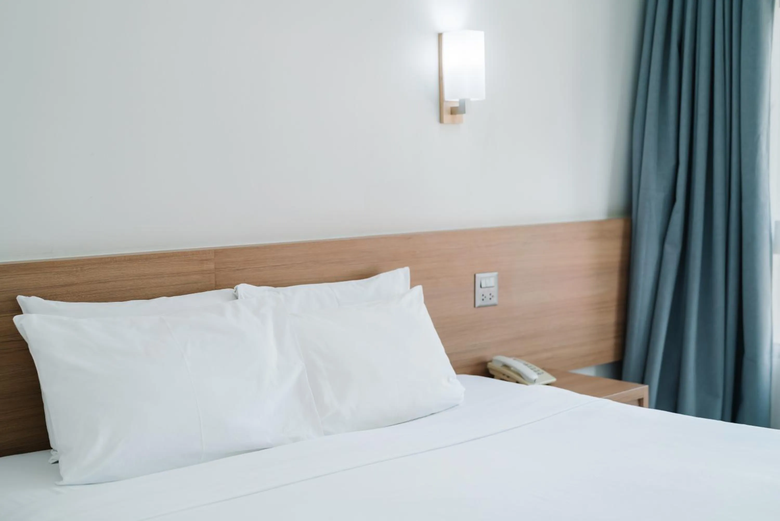 Bed in Pinnacle Lumpini Park Hotel