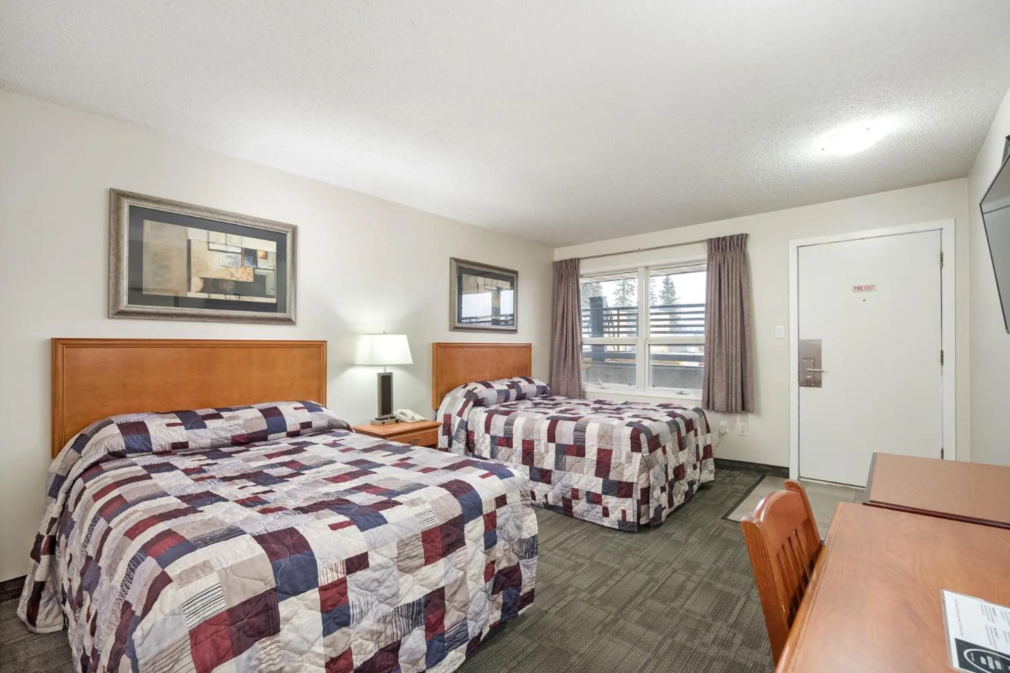 Bed in Guest House Inn & Suites