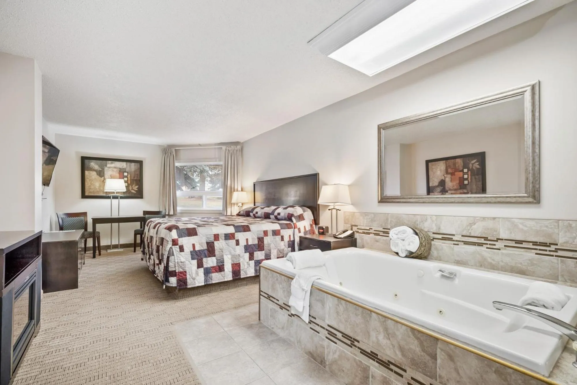 Bed in Guest House Inn & Suites