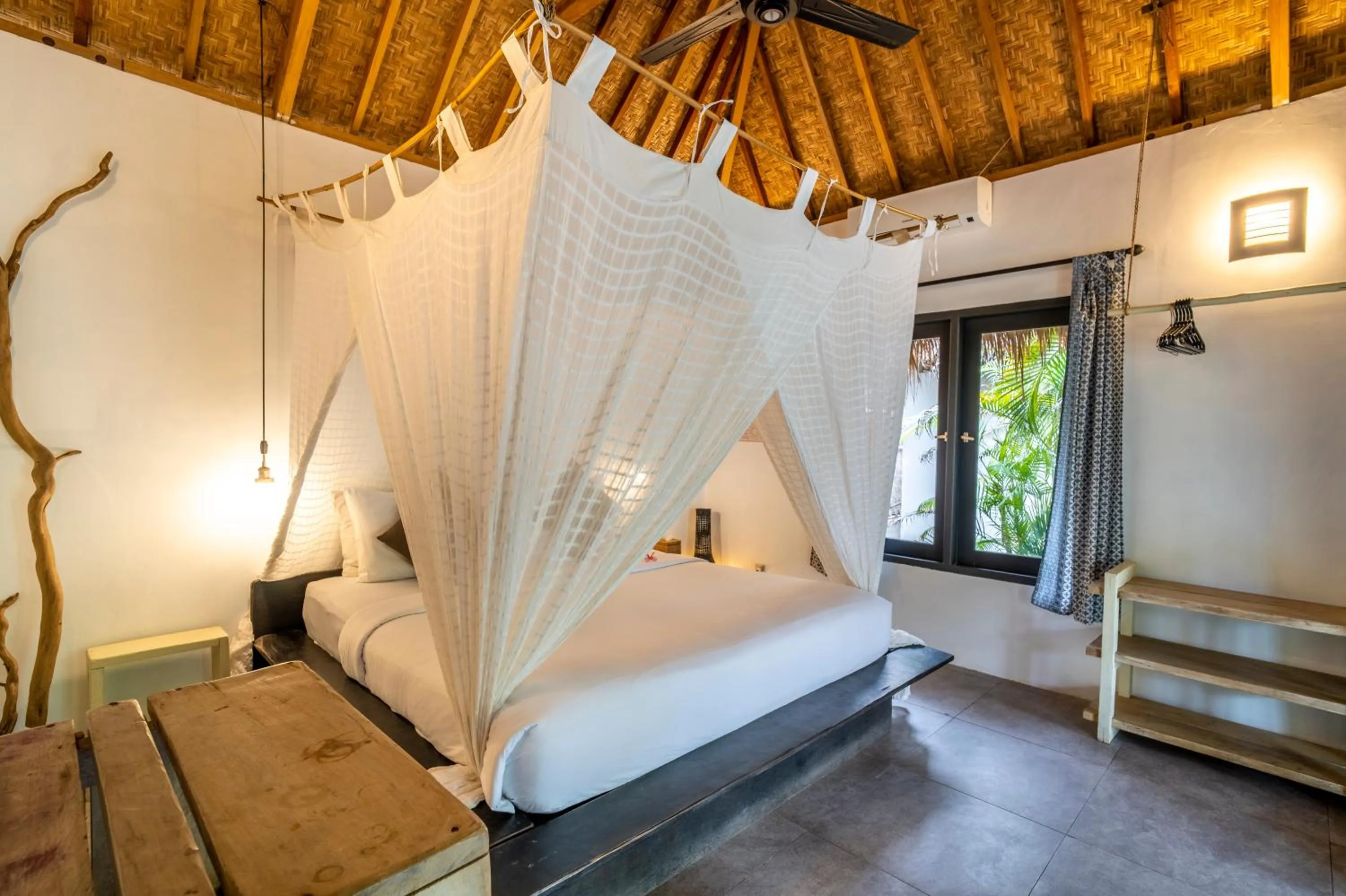 Bed in Breathe Villa Meno