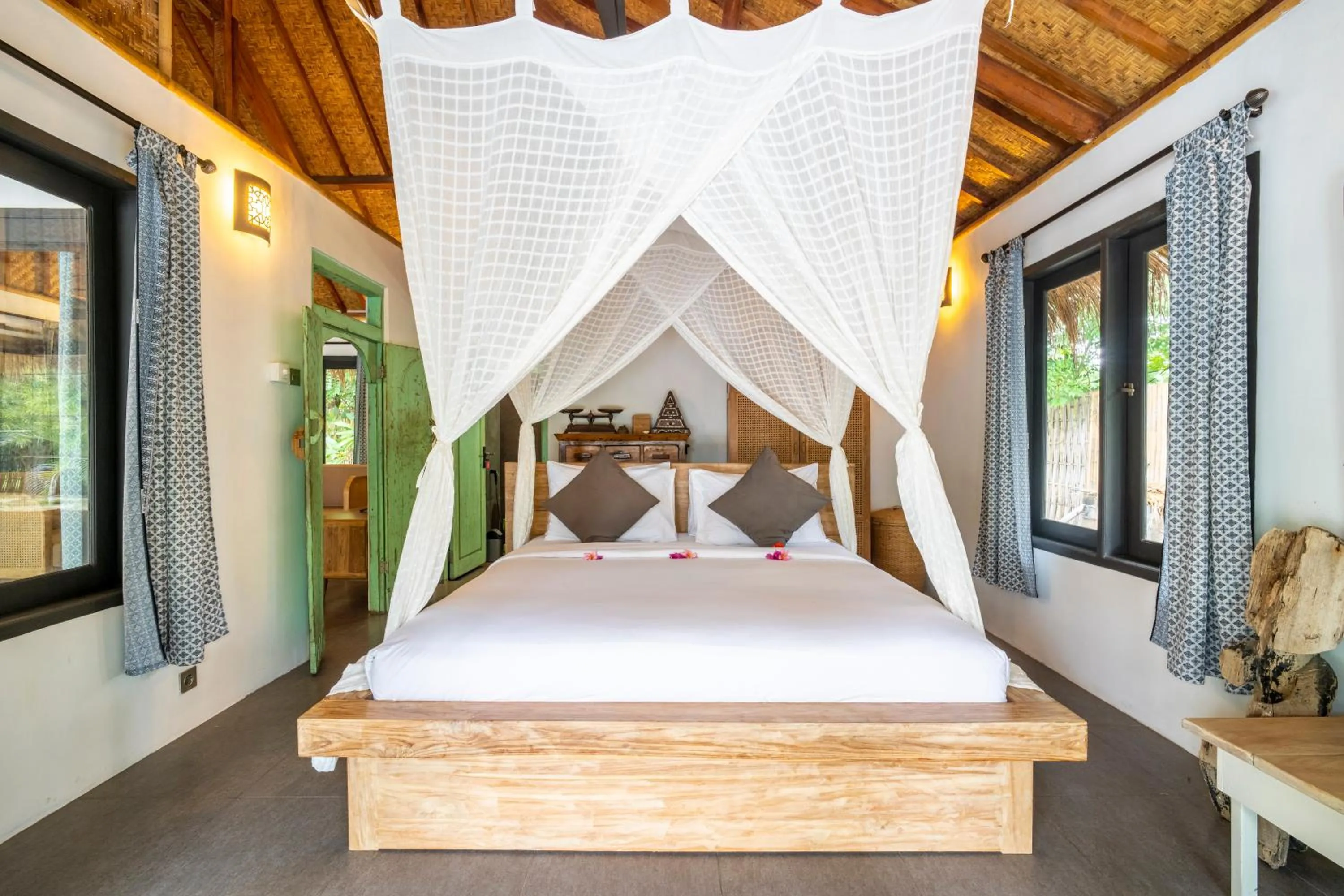 Bed in Breathe Villa Meno