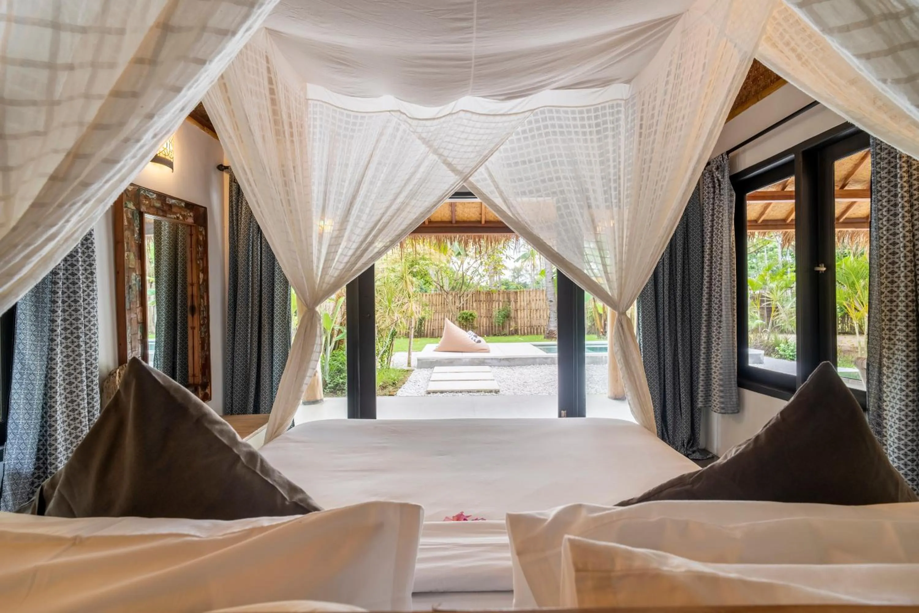 Bed in Breathe Villa Meno