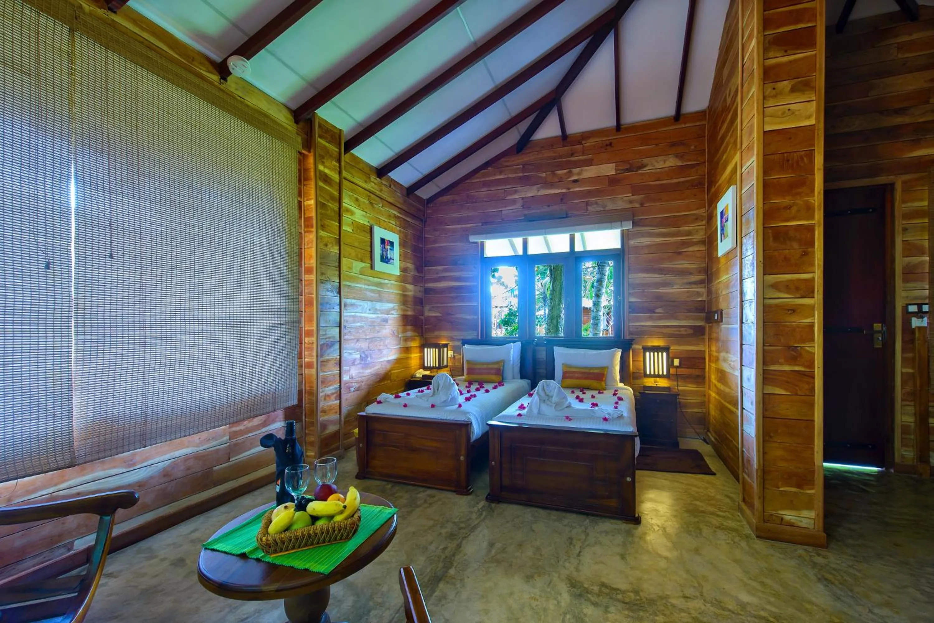 Bathroom, Bed in Karunakarala Ayurveda Resort