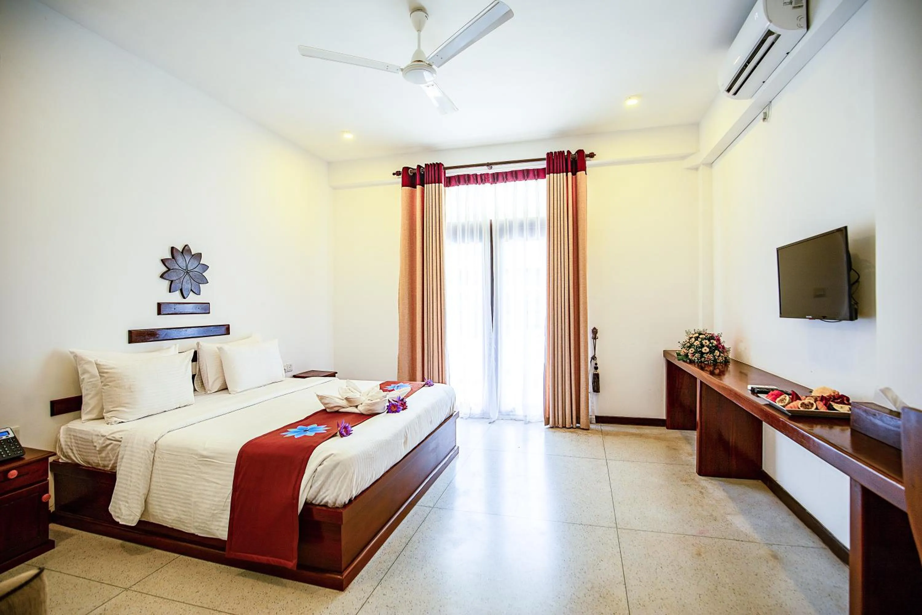 Bed in Karunakarala Ayurveda Resort