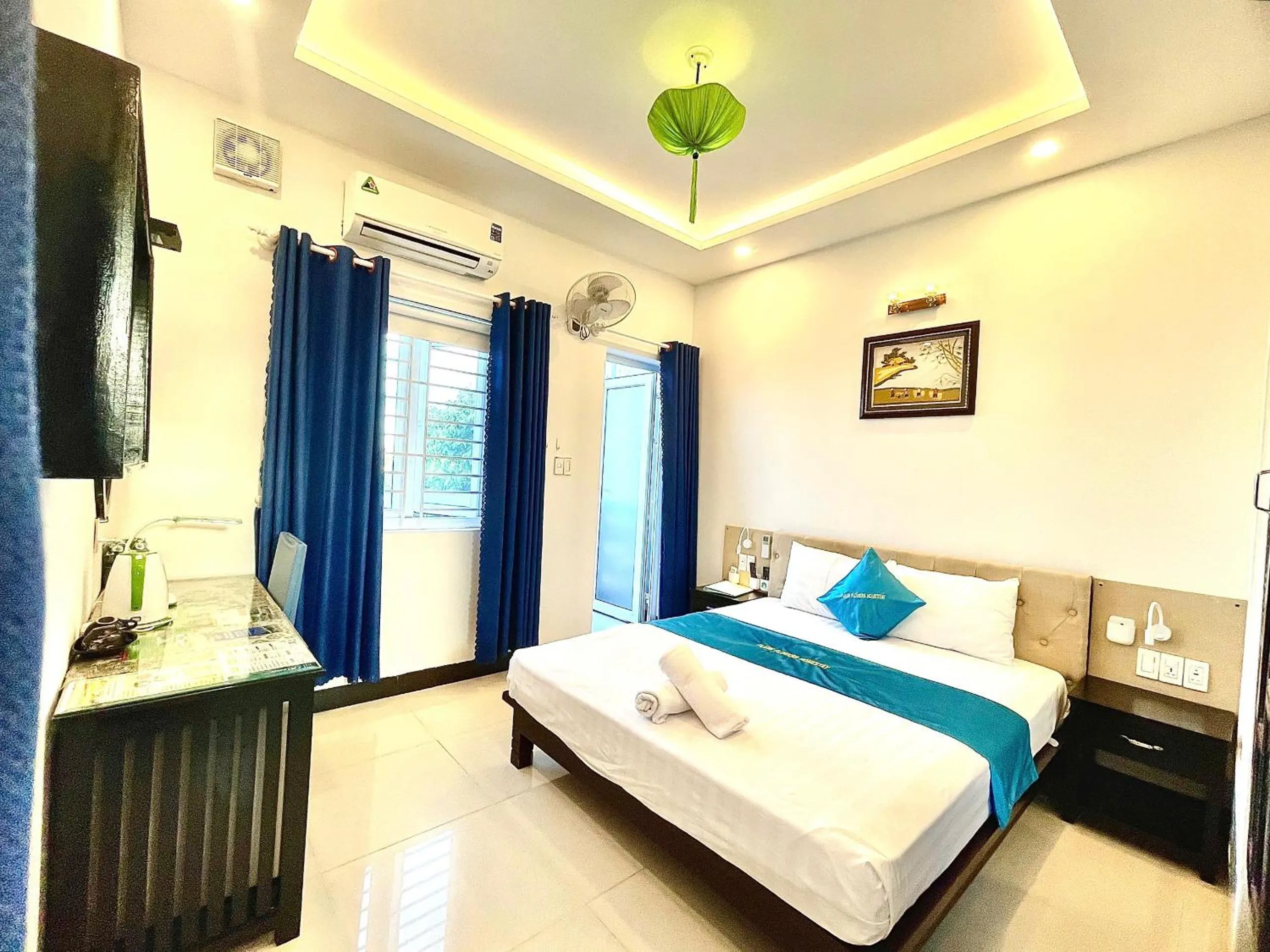 Bed in Flame Flowers Homestay