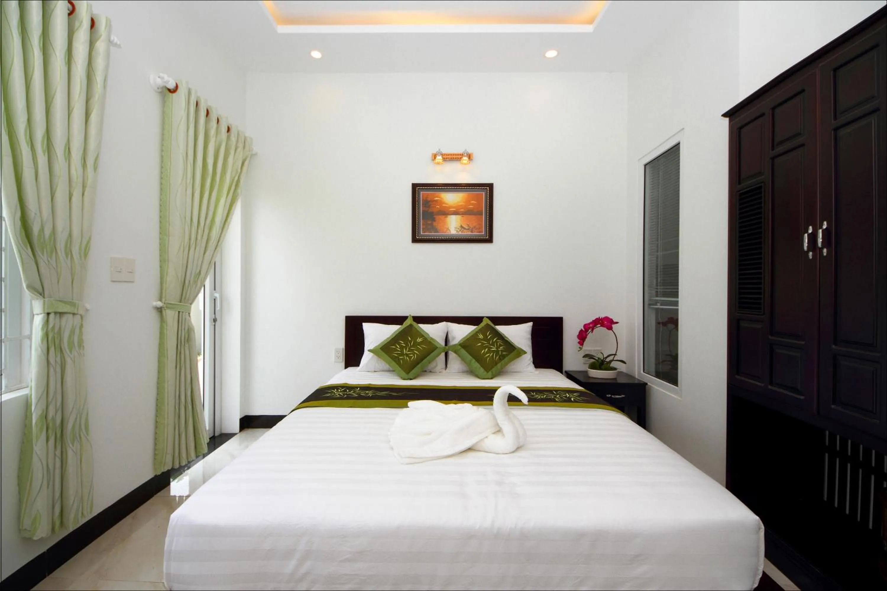 Bed in Flame Flowers Homestay