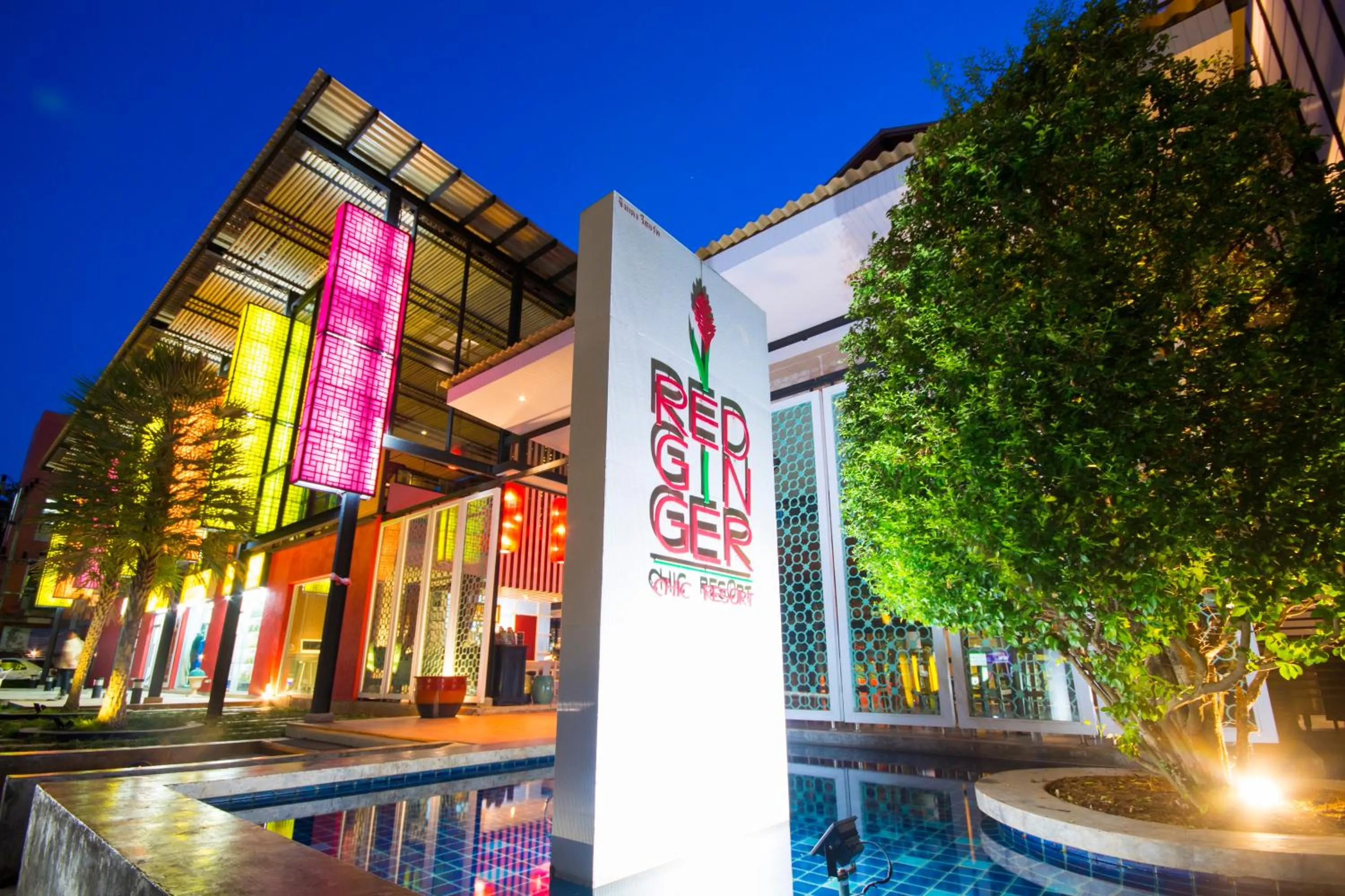 Property logo or sign in Red Ginger Chic Resort