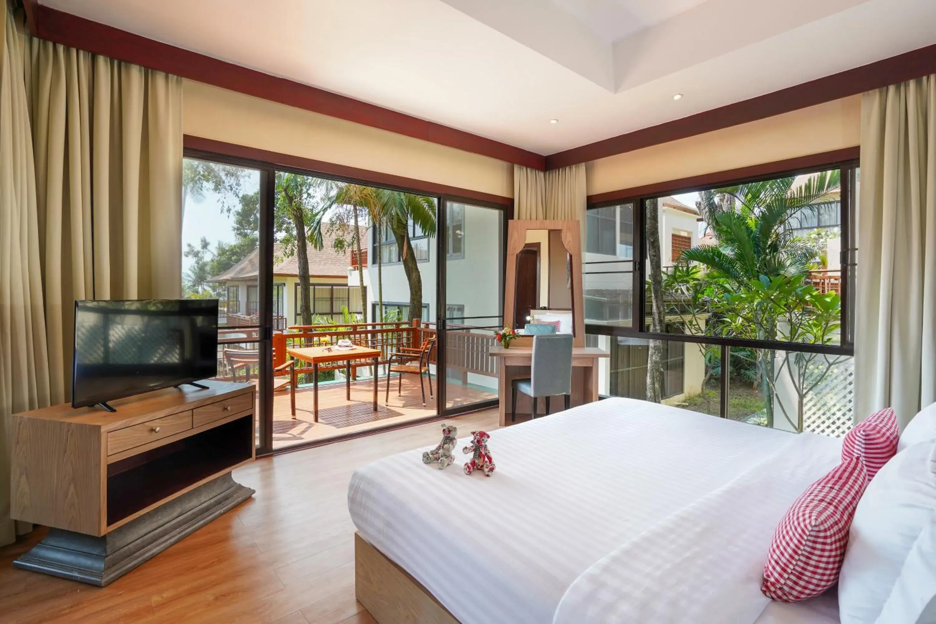 Balcony/Terrace, Bed in The Briza Beach Resort, Samui - SHA Plus Balcony/Terrace, Bed in The Briza Beach Resort, Samui - SHA Plus
