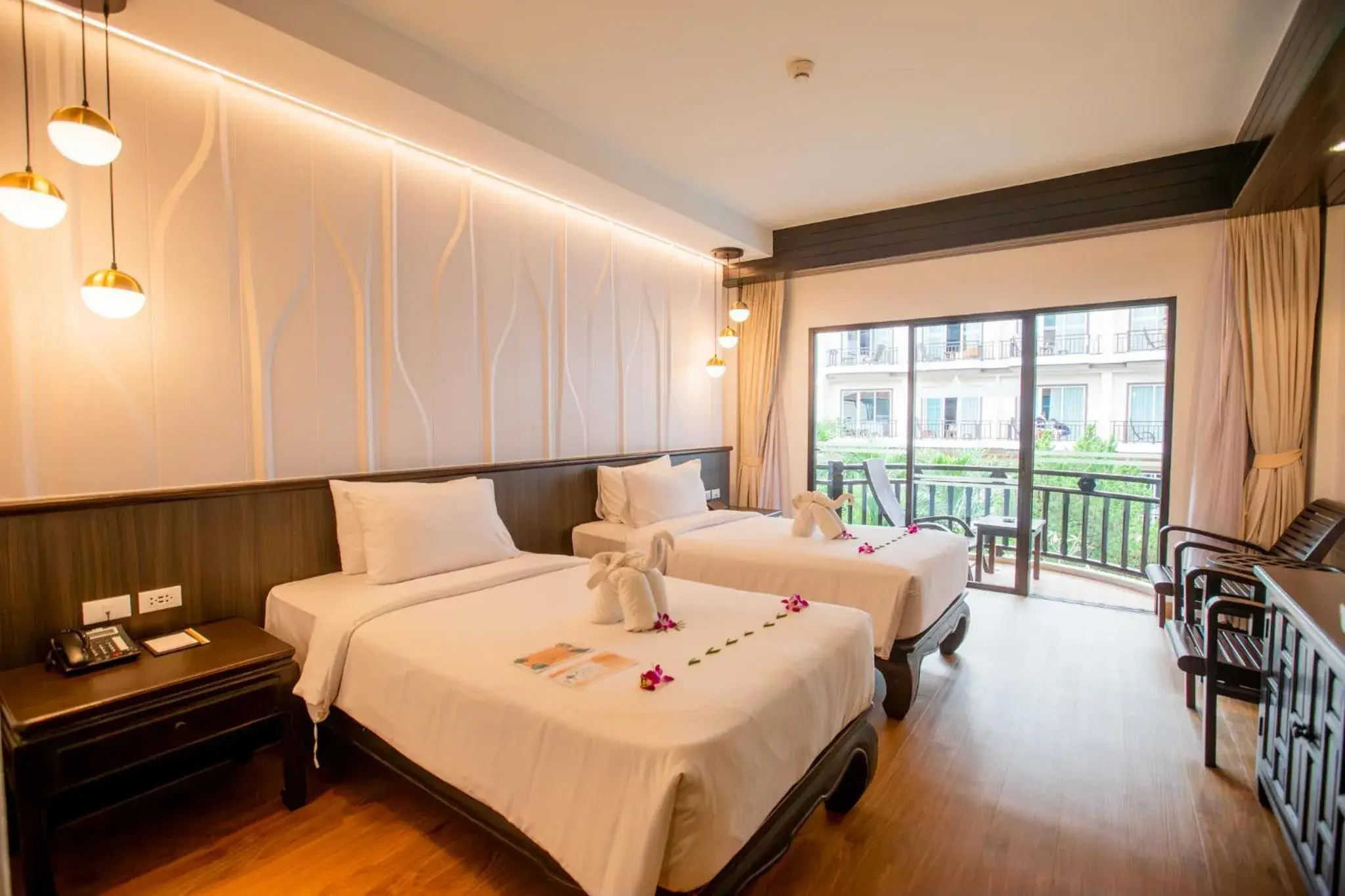 Photo of the whole room, Bed in Nipa Resort, Patong Beach Photo of the whole room, Bed in Nipa Resort, Patong Beach