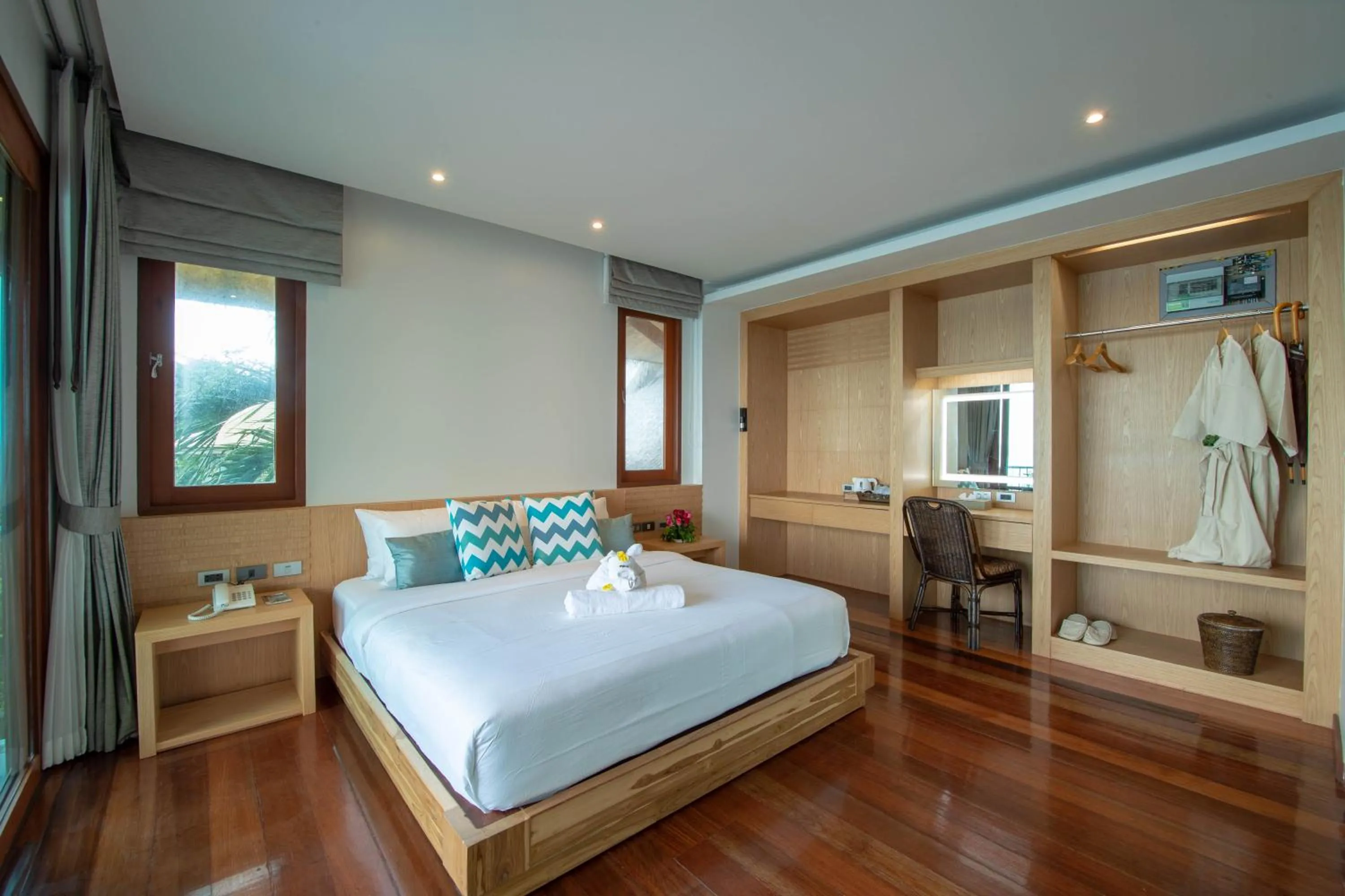 Seating area, Bed in Coral Cliff Beach Resort Samui - SHA Plus