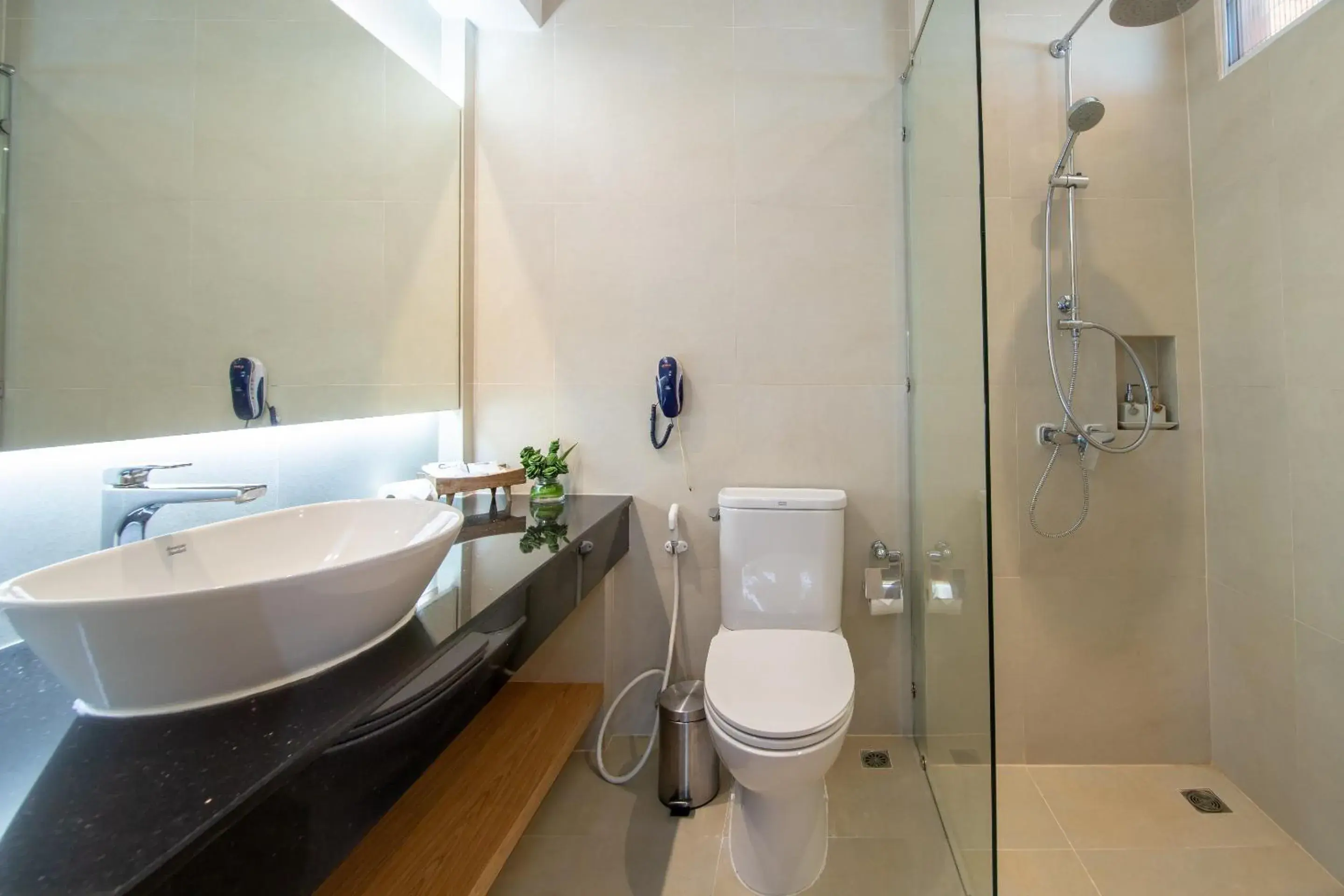 Bathroom in Coral Cliff Beach Resort Samui - SHA Plus Bathroom in Coral Cliff Beach Resort Samui - SHA Plus