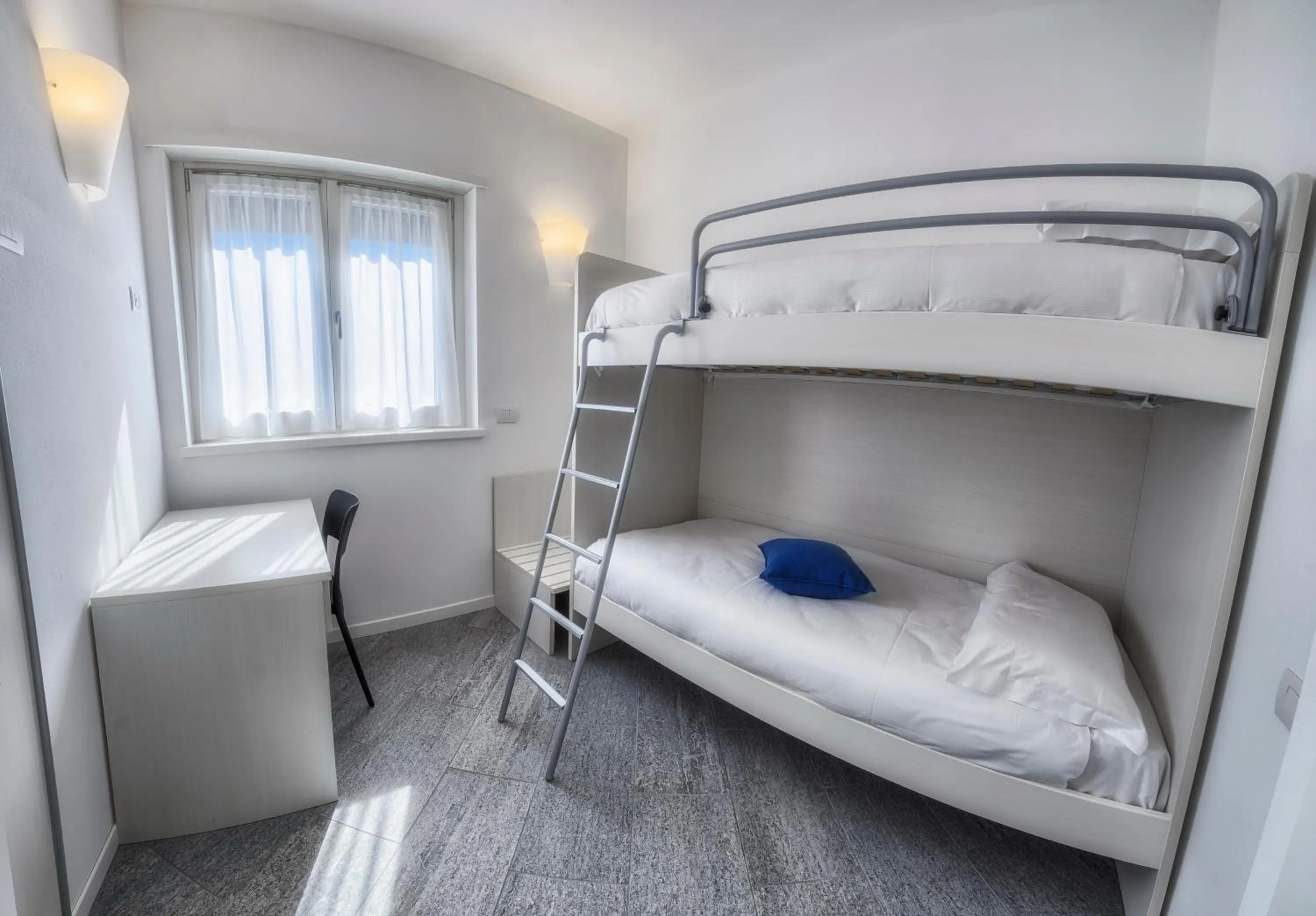 bunk bed, Bed in Rainbow Holiday Apartments Lake Como