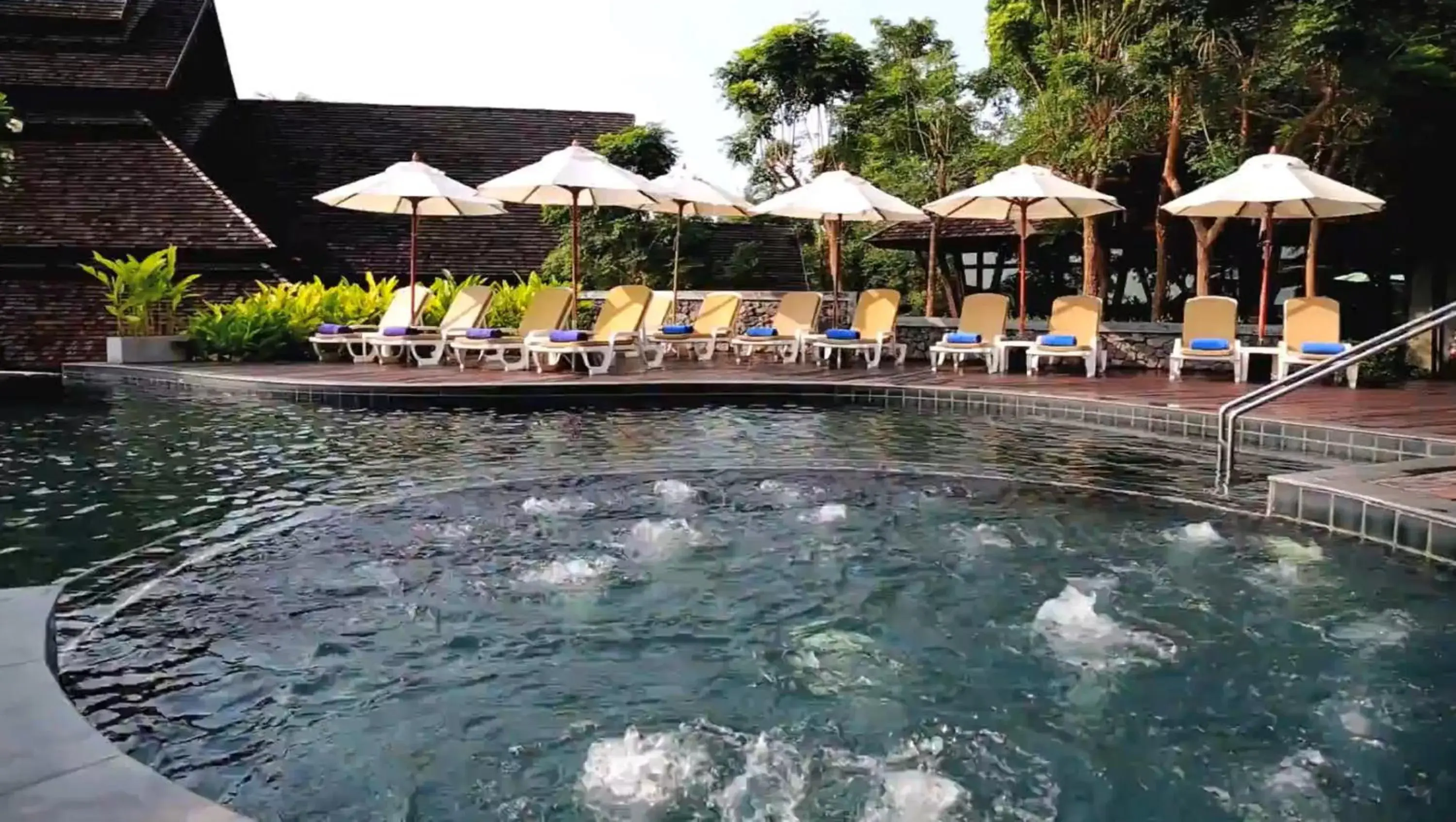 Pool view in Nora Buri Resort & Spa - SHA Extra Plus Pool view in Nora Buri Resort & Spa - SHA Extra Plus