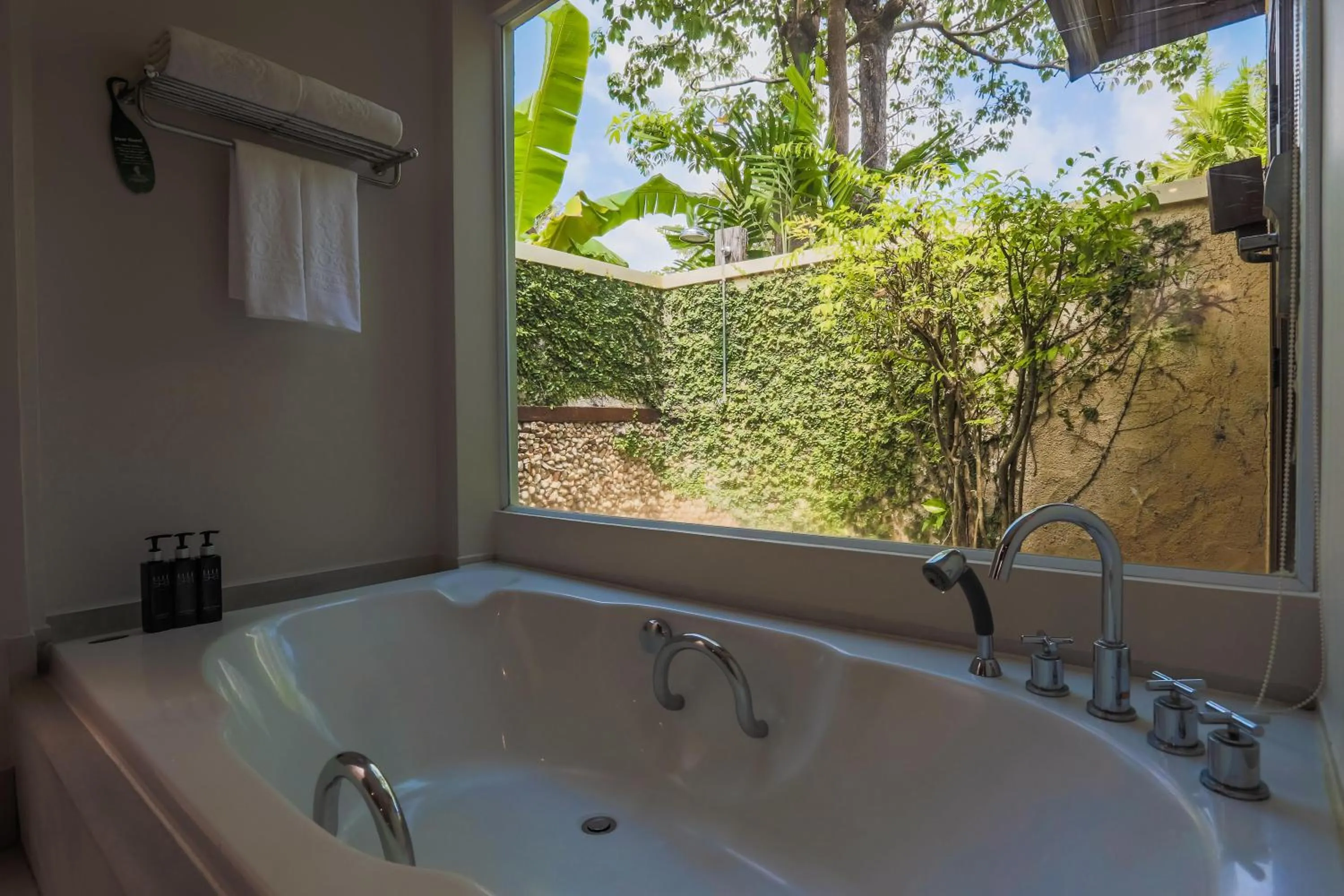 Bathroom in Nora Beach Resort & Spa - SHA Extra Plus