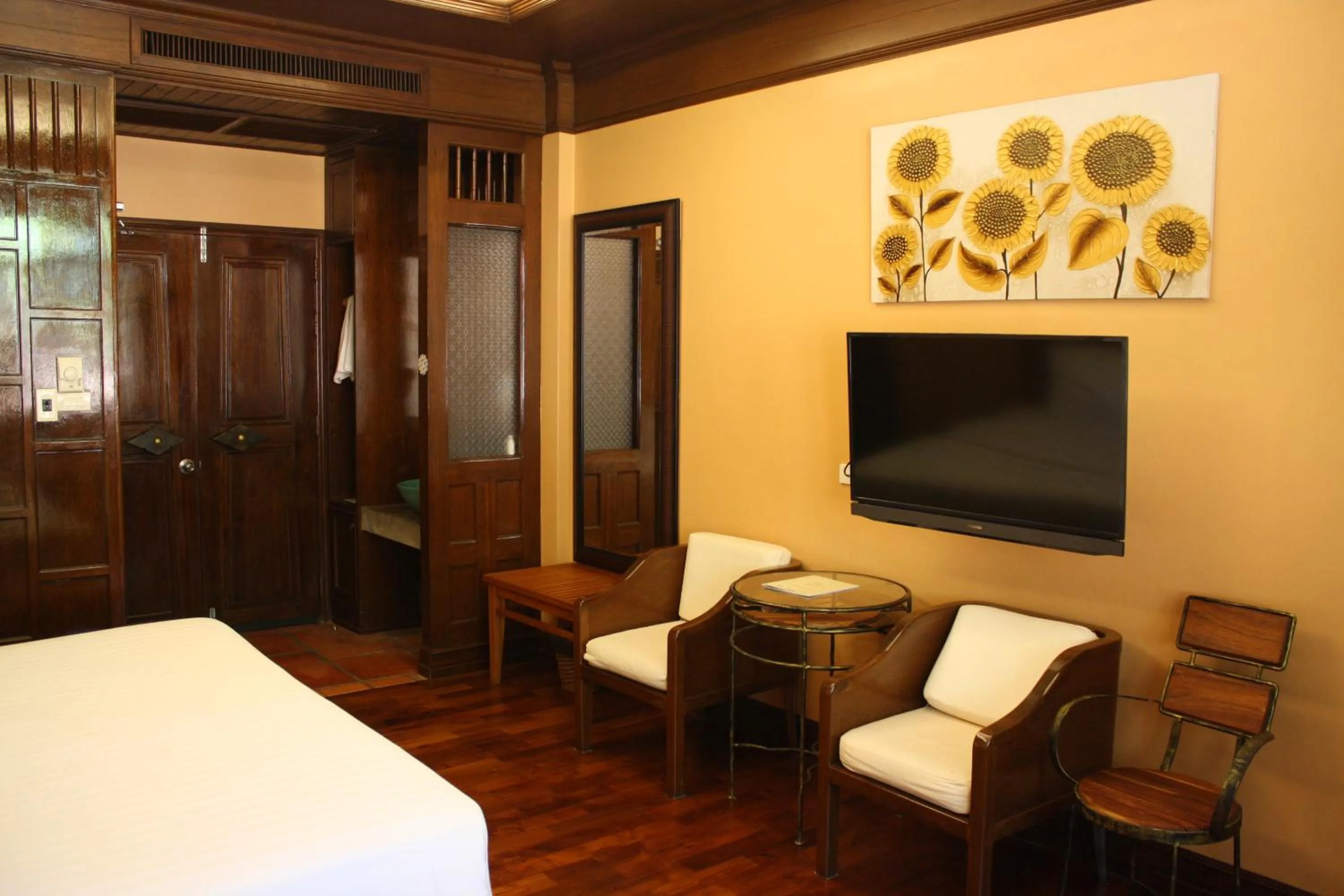 Seating area, Bed in The Aiyapura Koh Chang