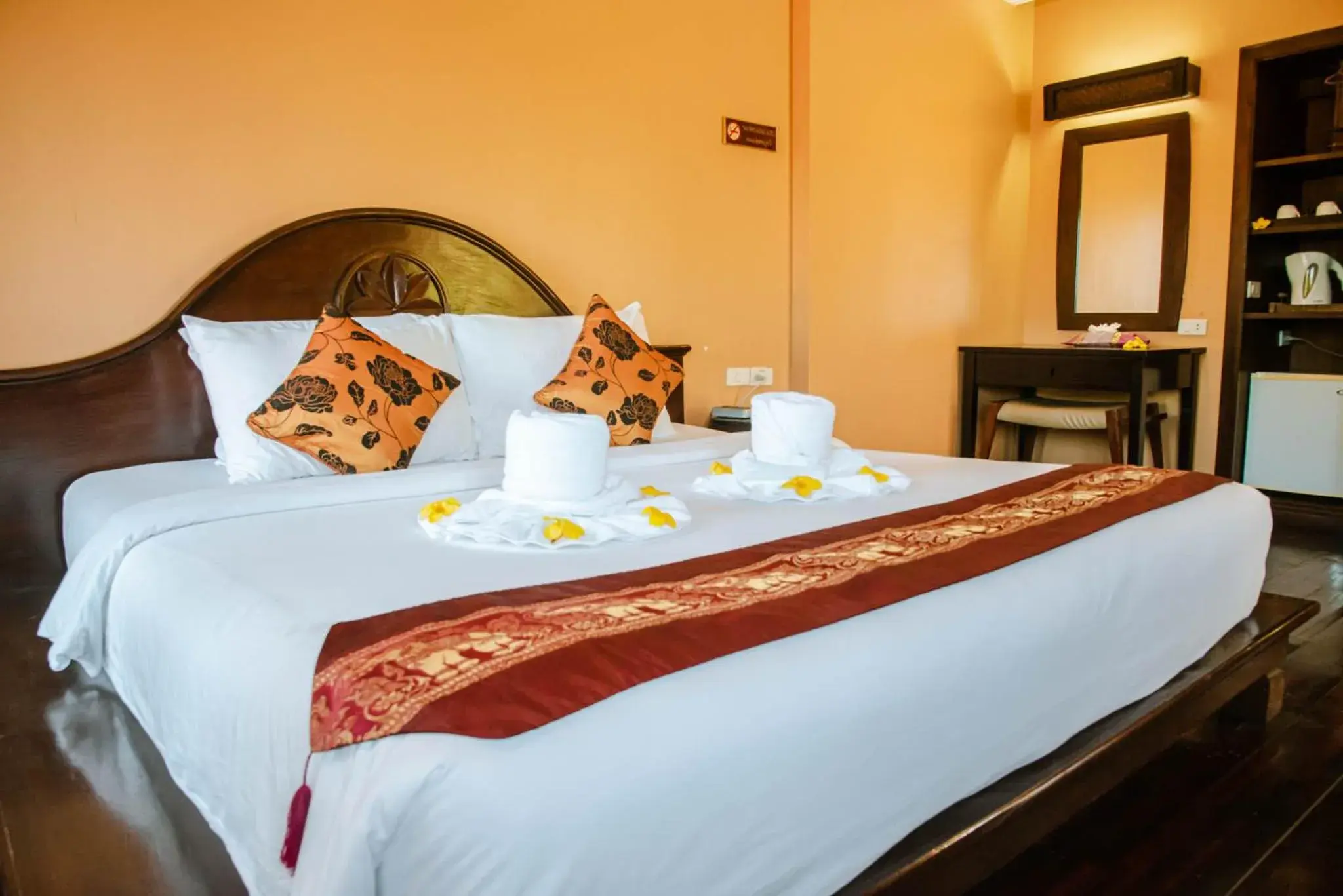 Bed in The Aiyapura Koh Chang Bed in The Aiyapura Koh Chang