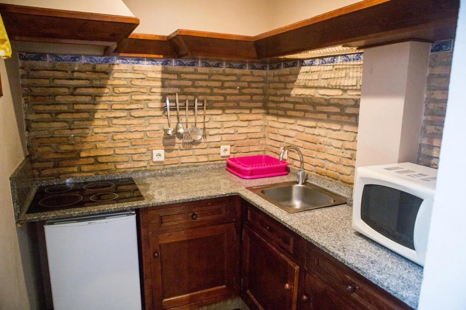 Kitchen or kitchenette in Apartamentos Turísticos Bahía Sur