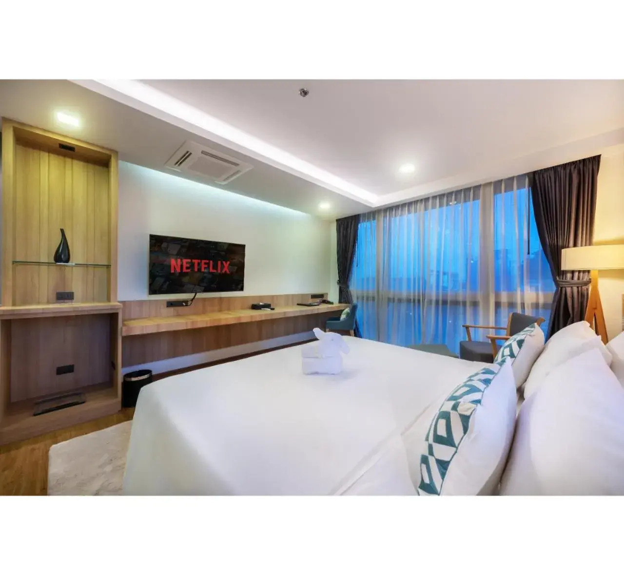 Bed in PLAAI Prime Hotel Rayong SHA Extra Plus Bed in PLAAI Prime Hotel Rayong SHA Extra Plus