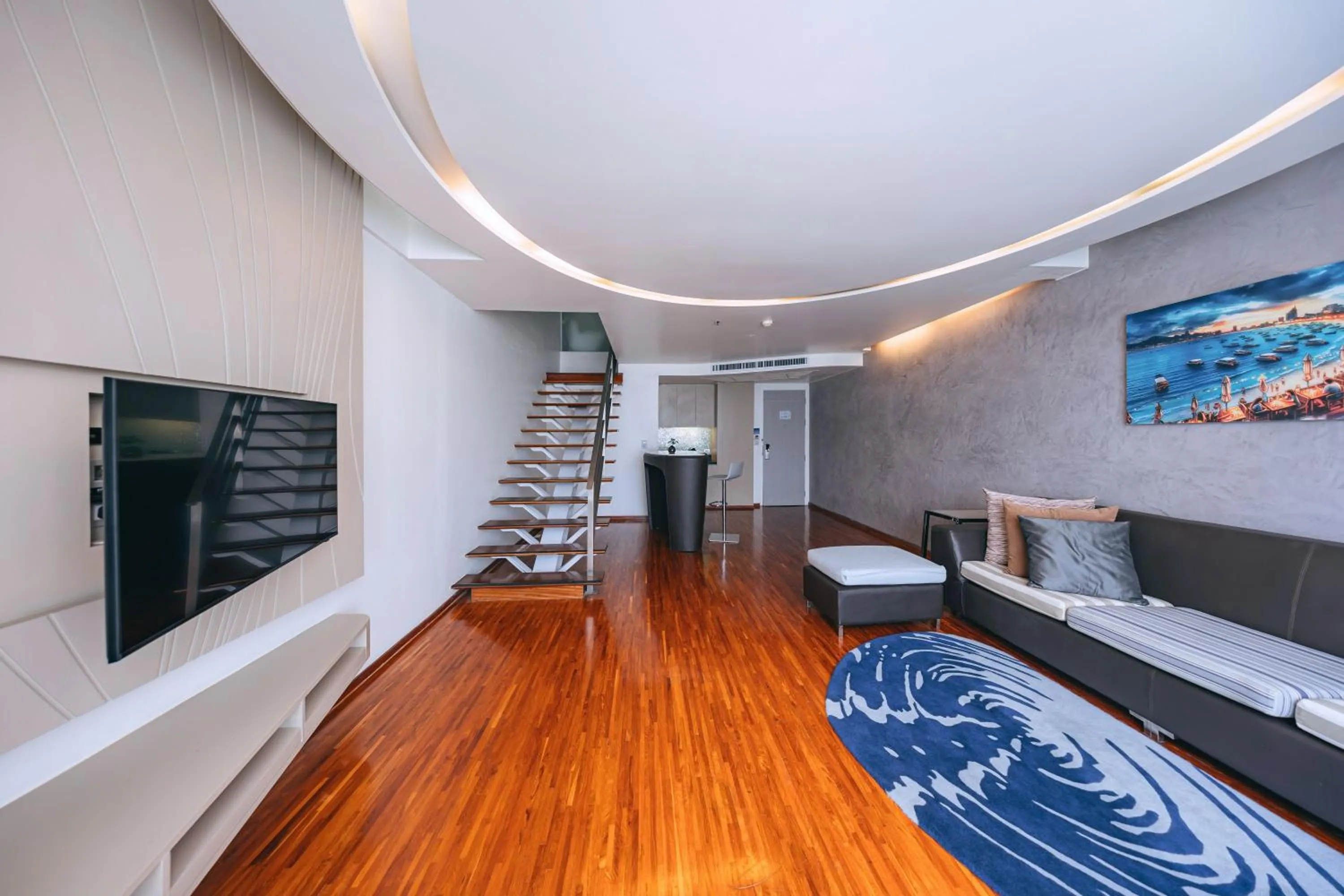 Living room in Hotel Baraquda Heeton Pattaya by Compass Hospitality