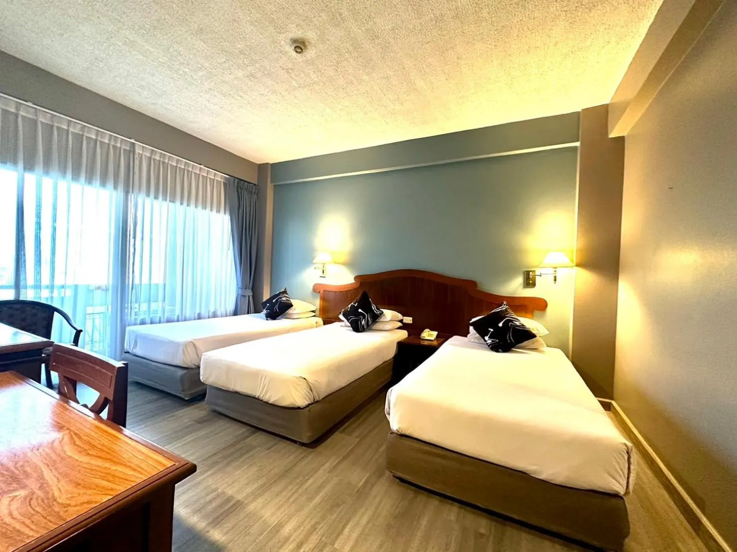 Bed in Chiangmai Gate Hotel