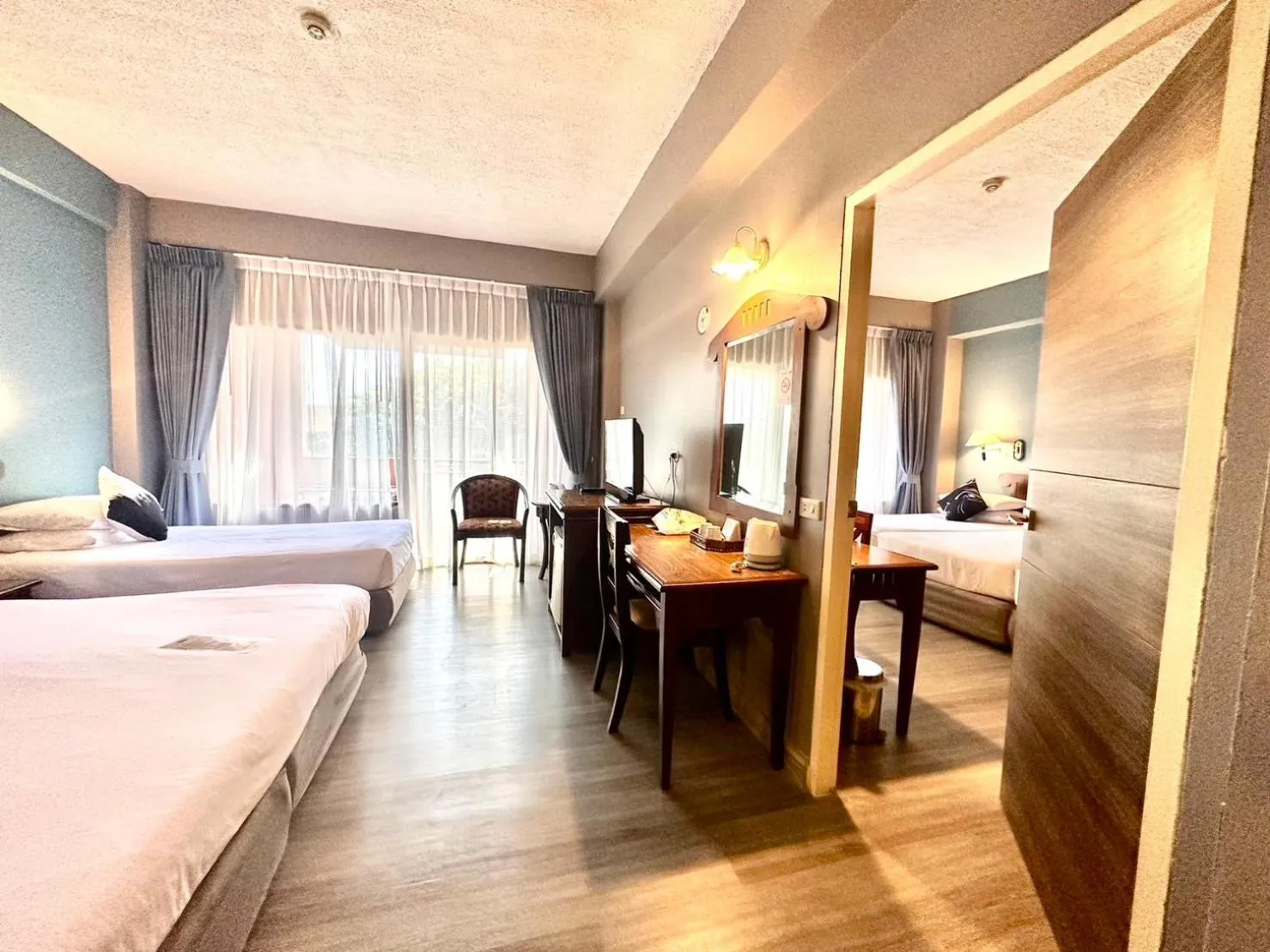 Bed in Chiangmai Gate Hotel