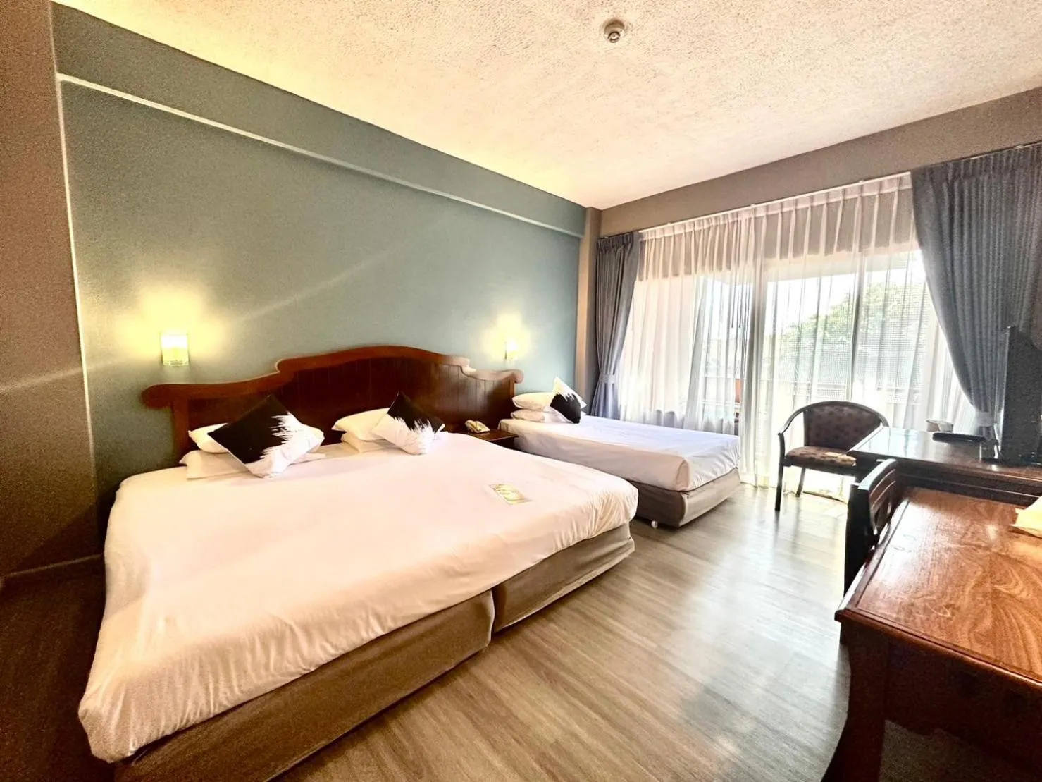 Bed in Chiangmai Gate Hotel