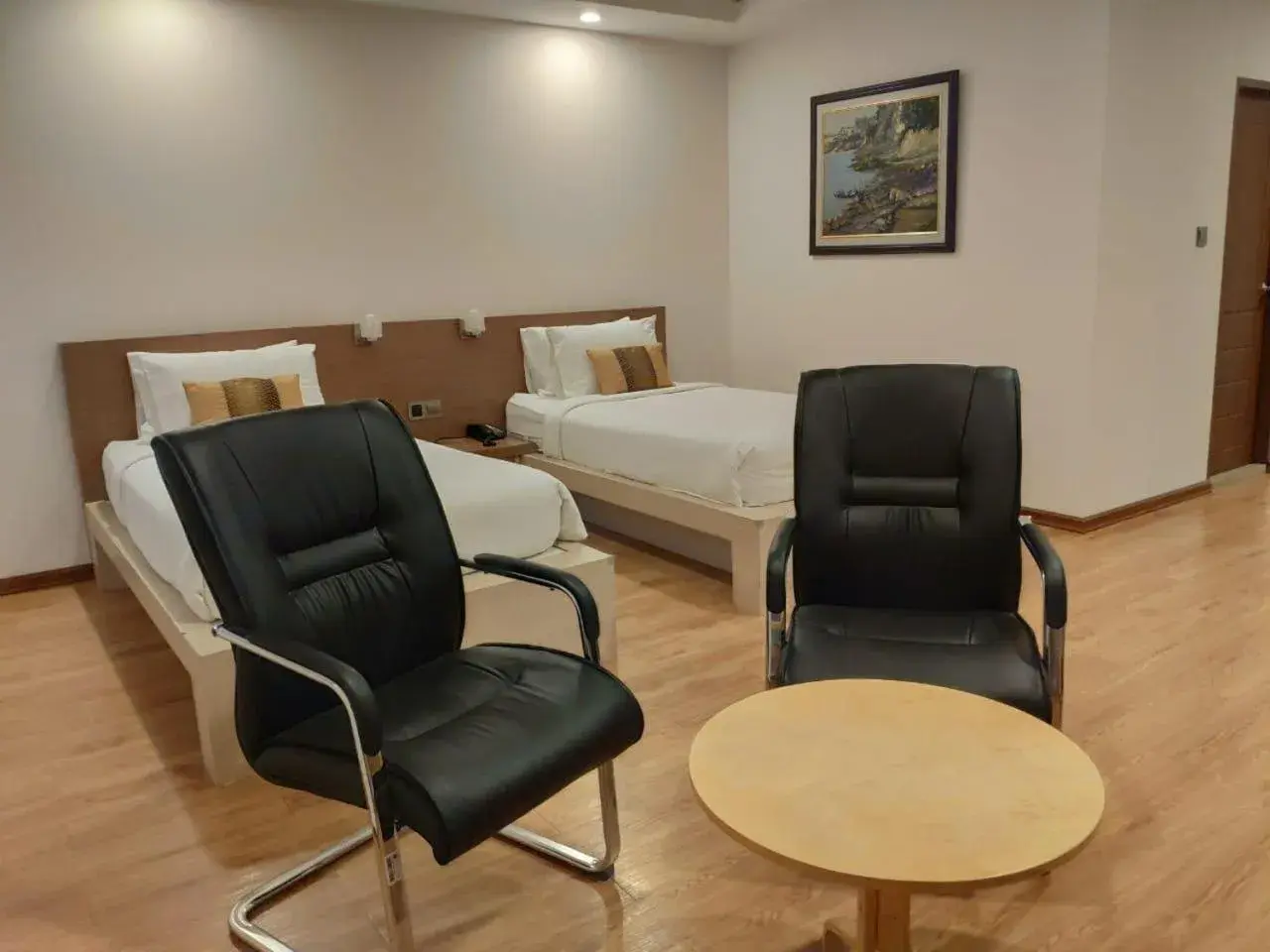 Seating area, Bed in Serene Valley Hotel Seating area, Bed in Serene Valley Hotel